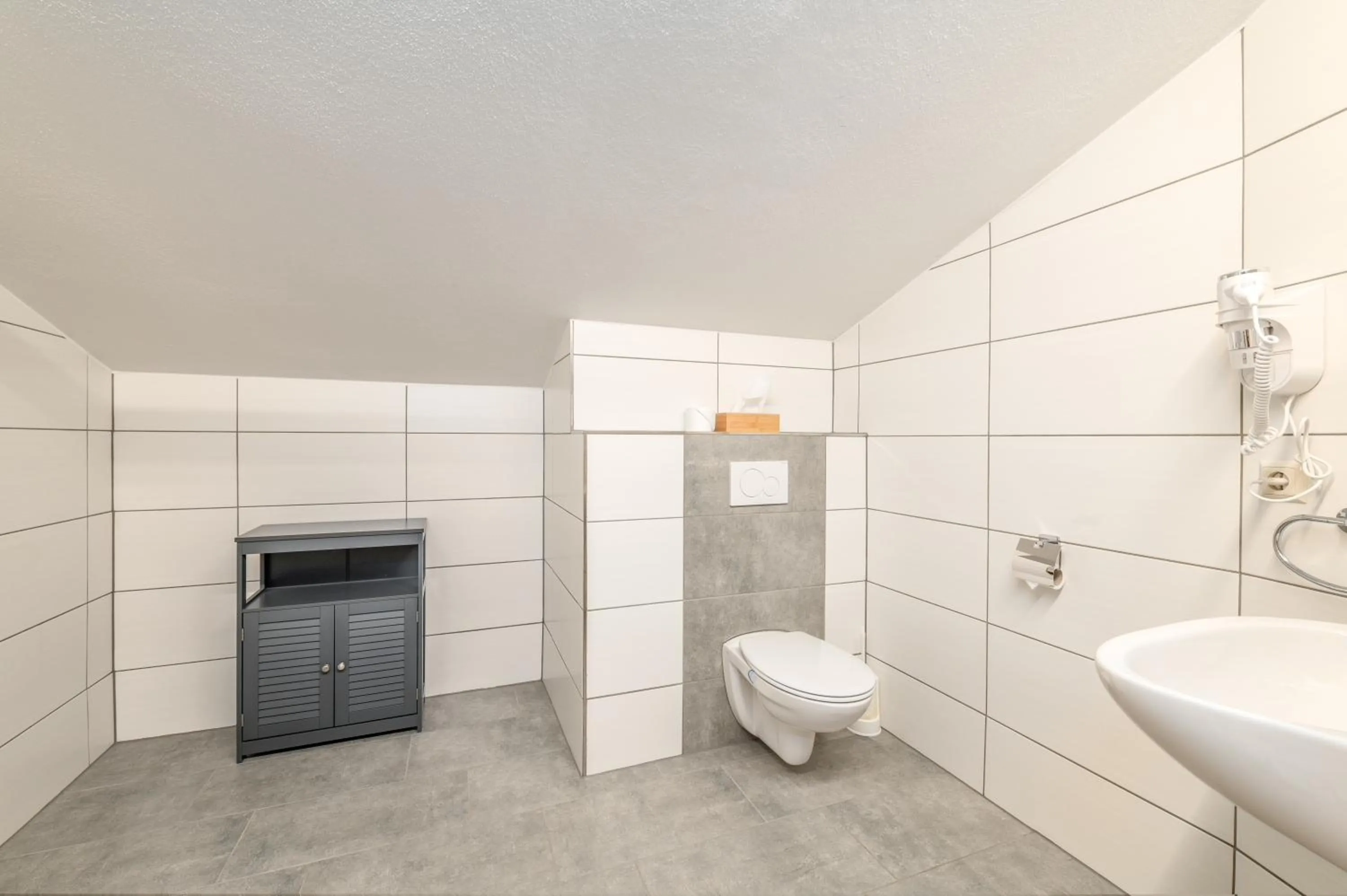 Bathroom in Panoramahotel Stocker