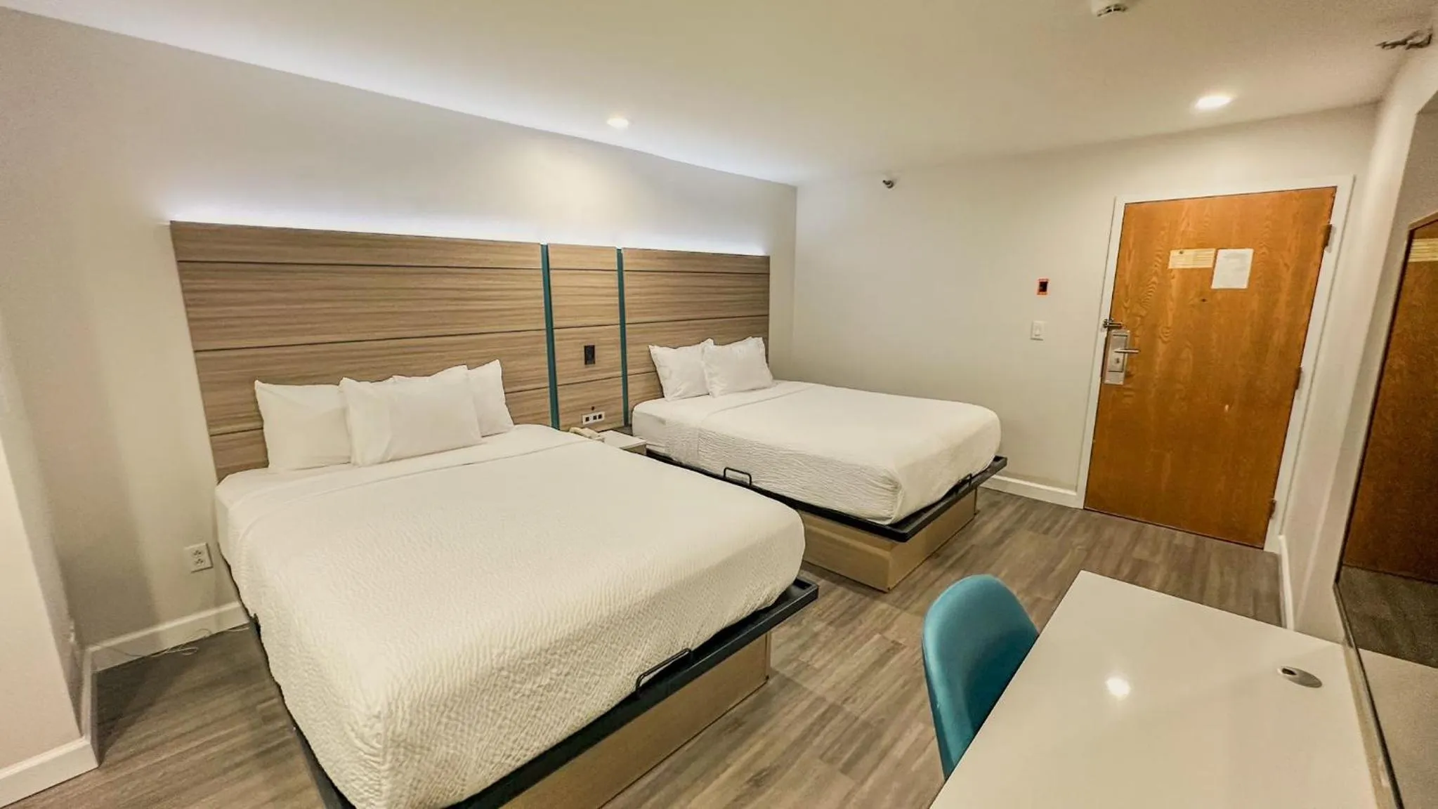 Bed in Microtel Inn by Wyndham Henrietta