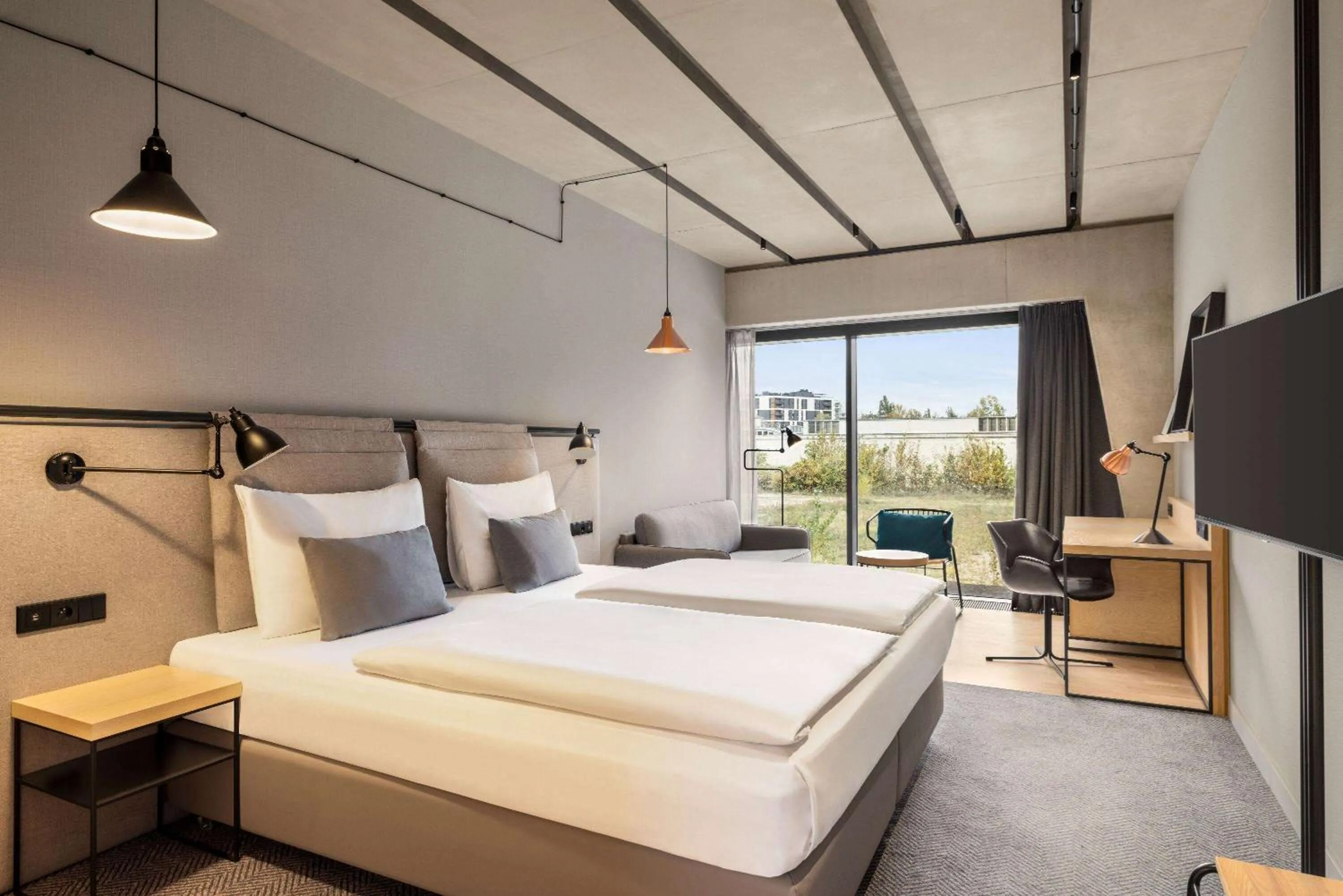 Photo of the whole room, Bed in Vienna House by Wyndham Mokotow Warsaw