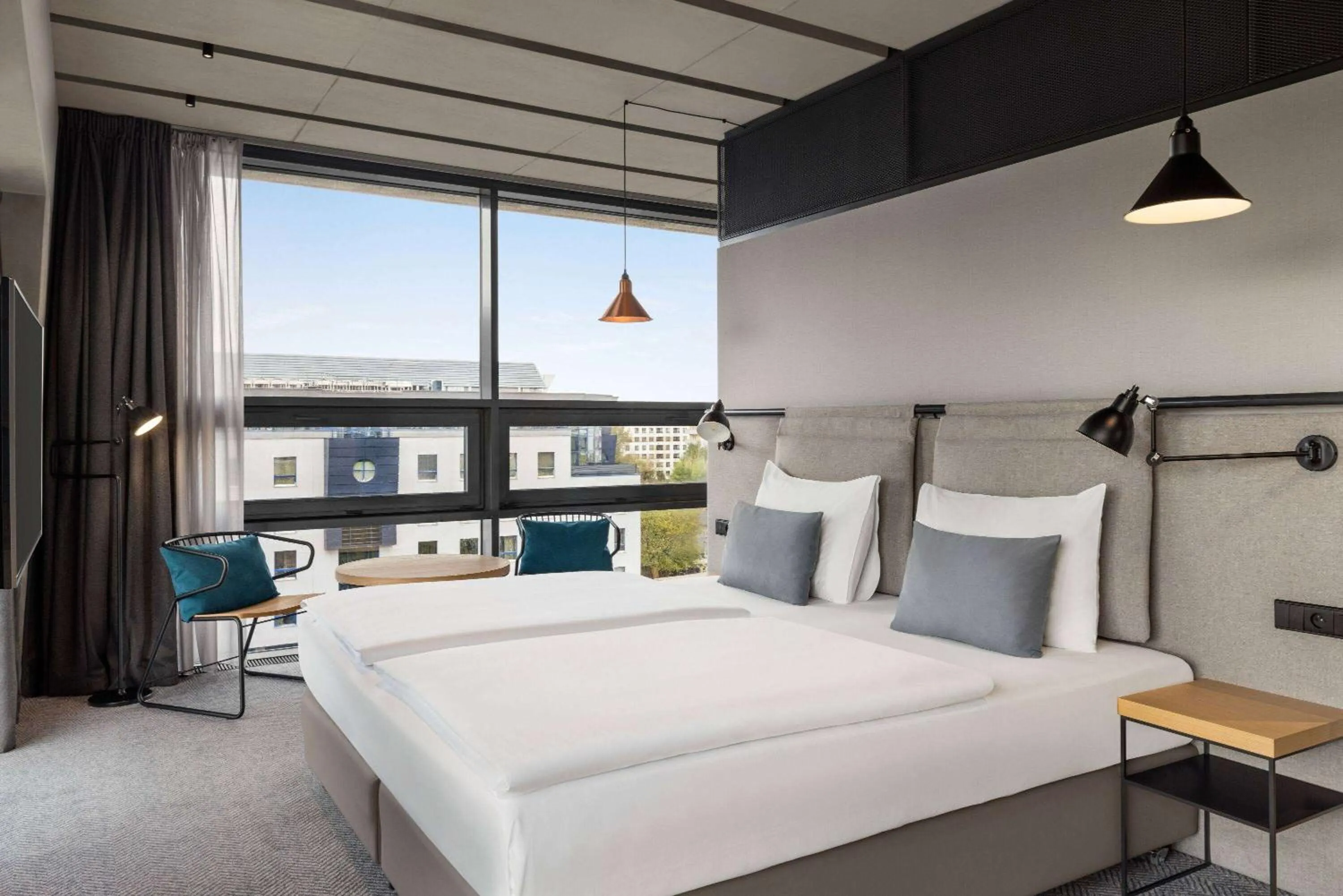 Photo of the whole room, Bed in Vienna House by Wyndham Mokotow Warsaw