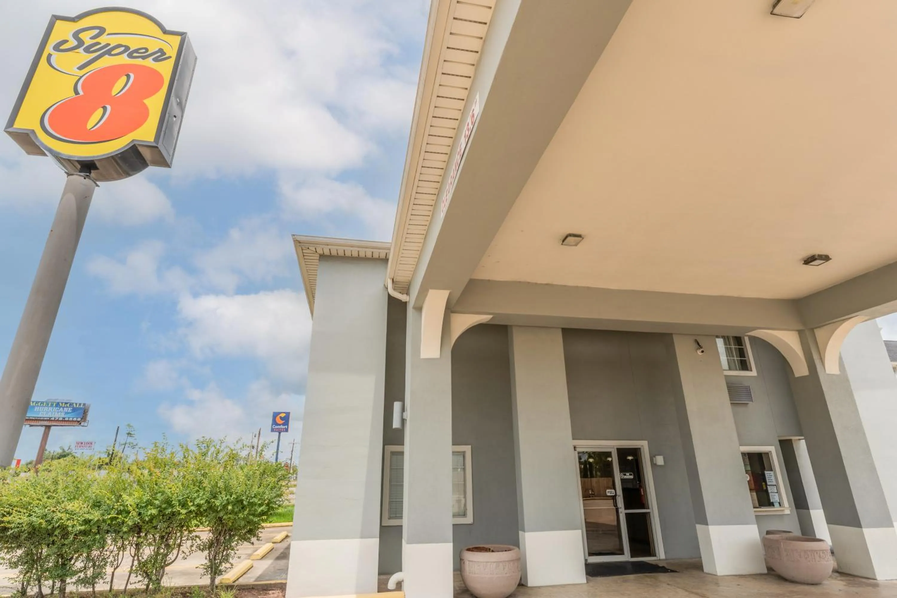 Property building in Super 8 by Wyndham Lake Charles Northeast