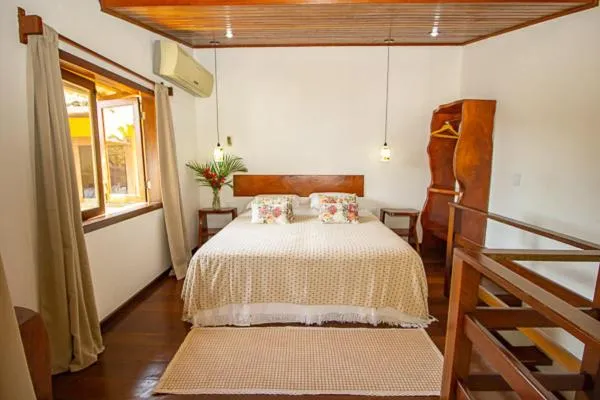 Bed in Pousada Funny