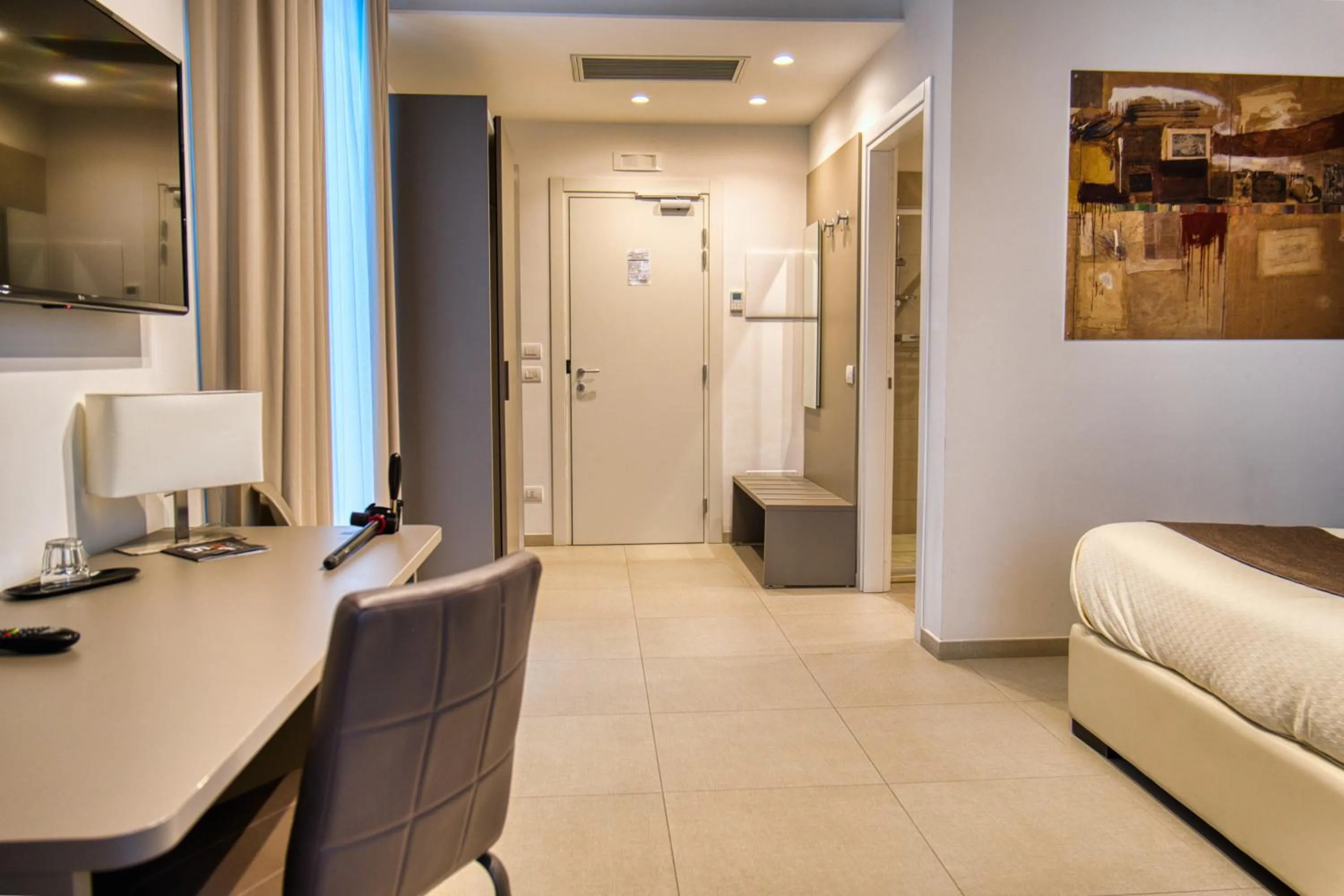 Bed in Moma Hotel Wellness & Spa