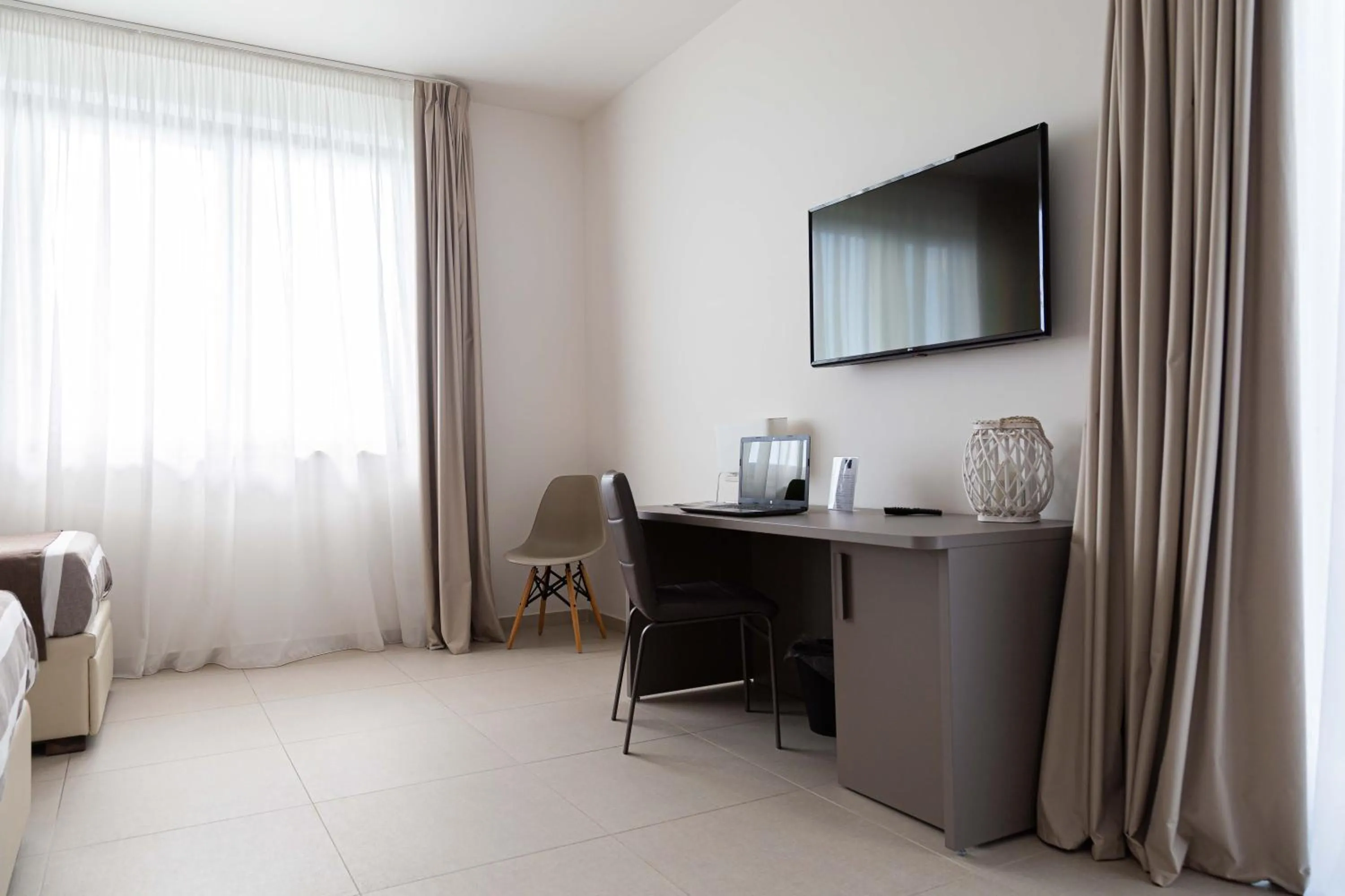 TV and multimedia, Bed in Moma Hotel Wellness & Spa