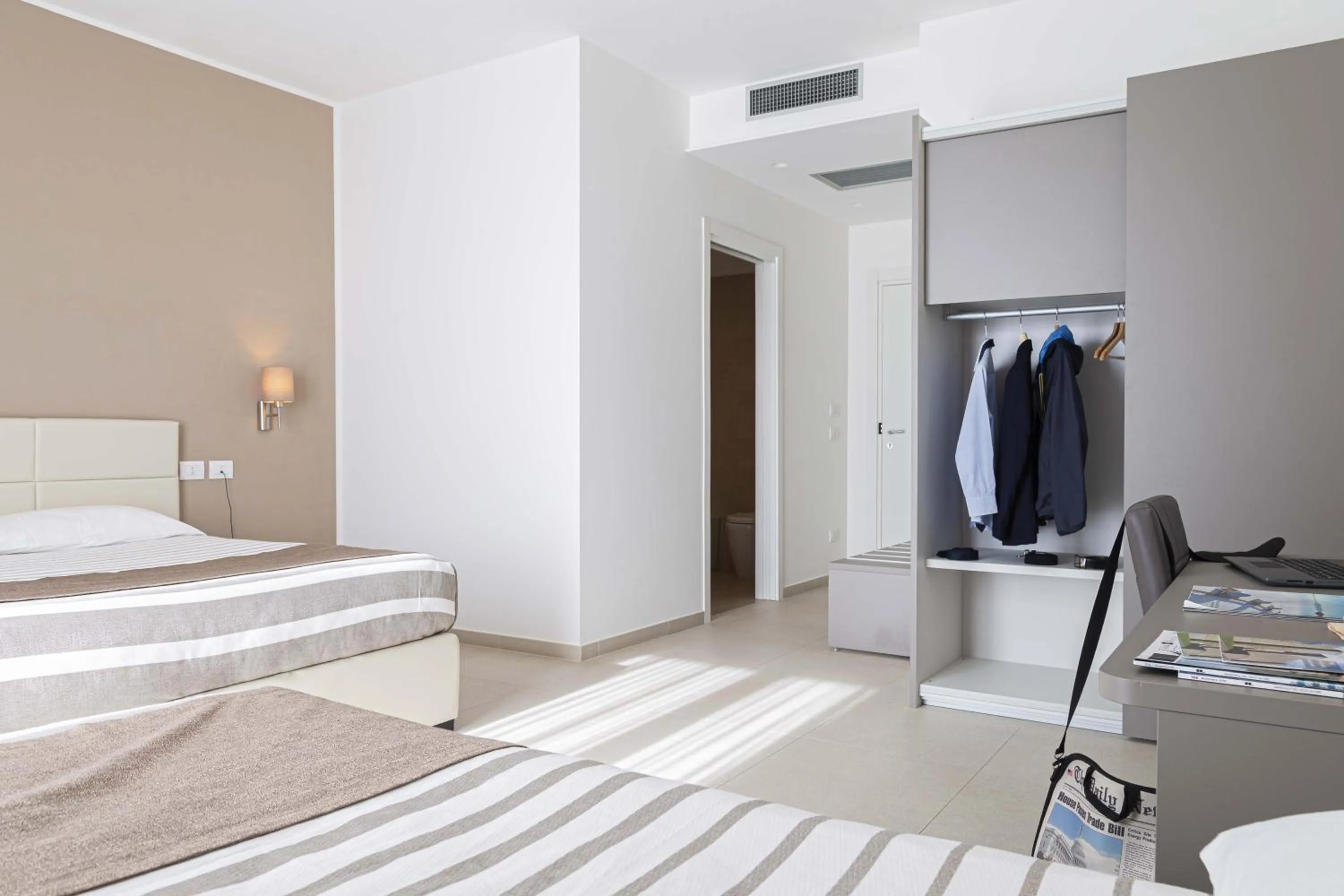 Bed in Moma Hotel Wellness & Spa