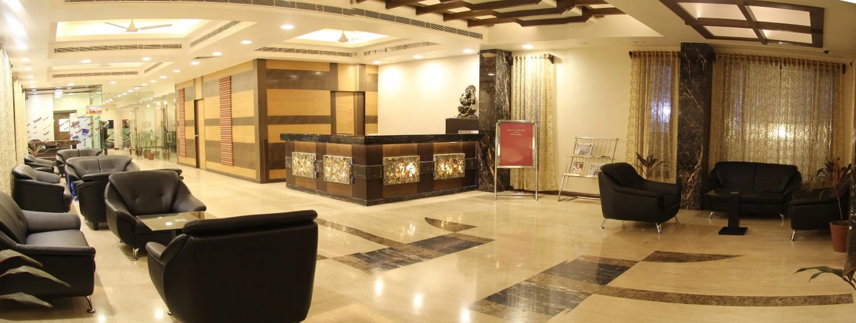 Lobby or reception in Amantra Comfort Hotel