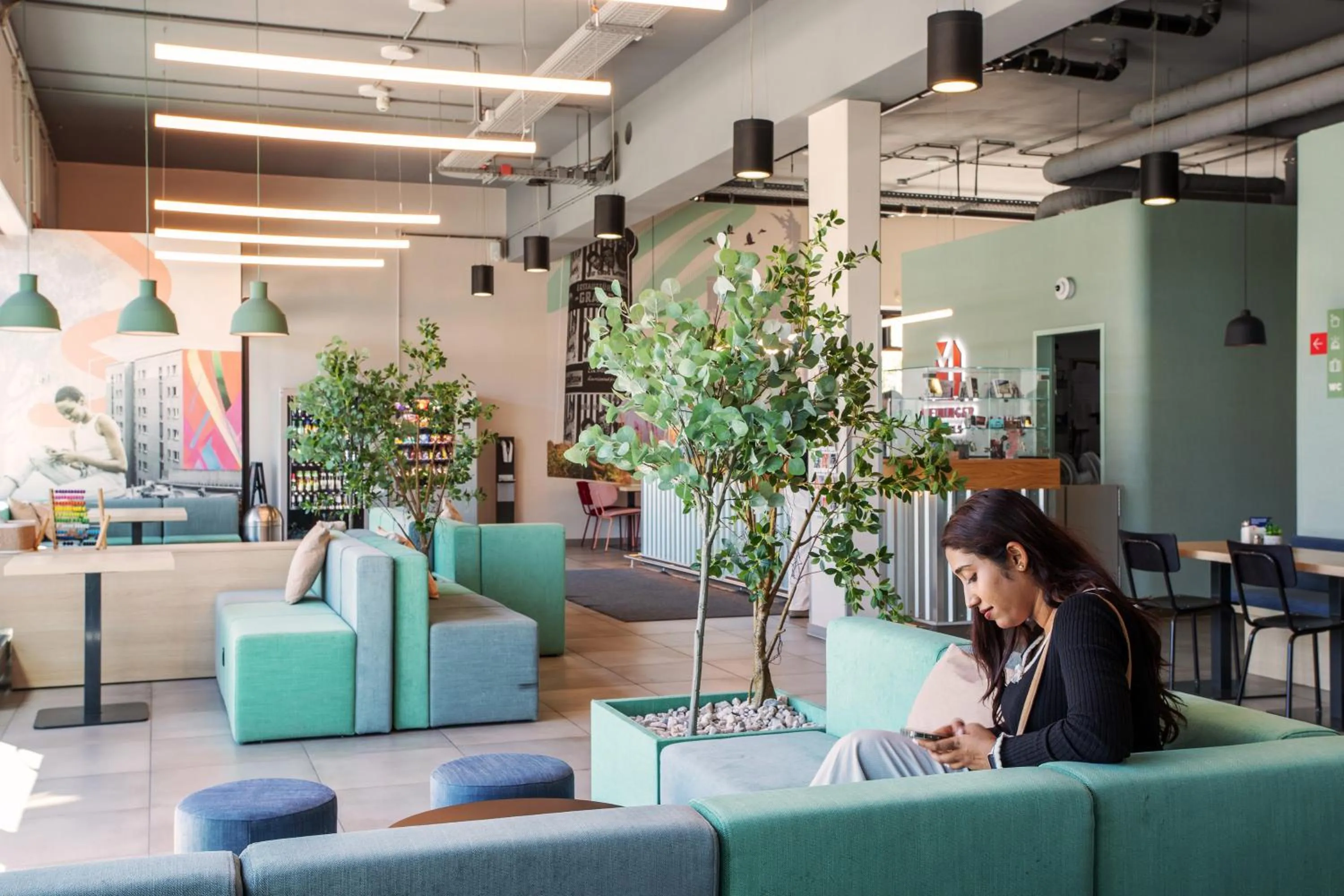 Lobby or reception in MEININGER Hotel Berlin Airport