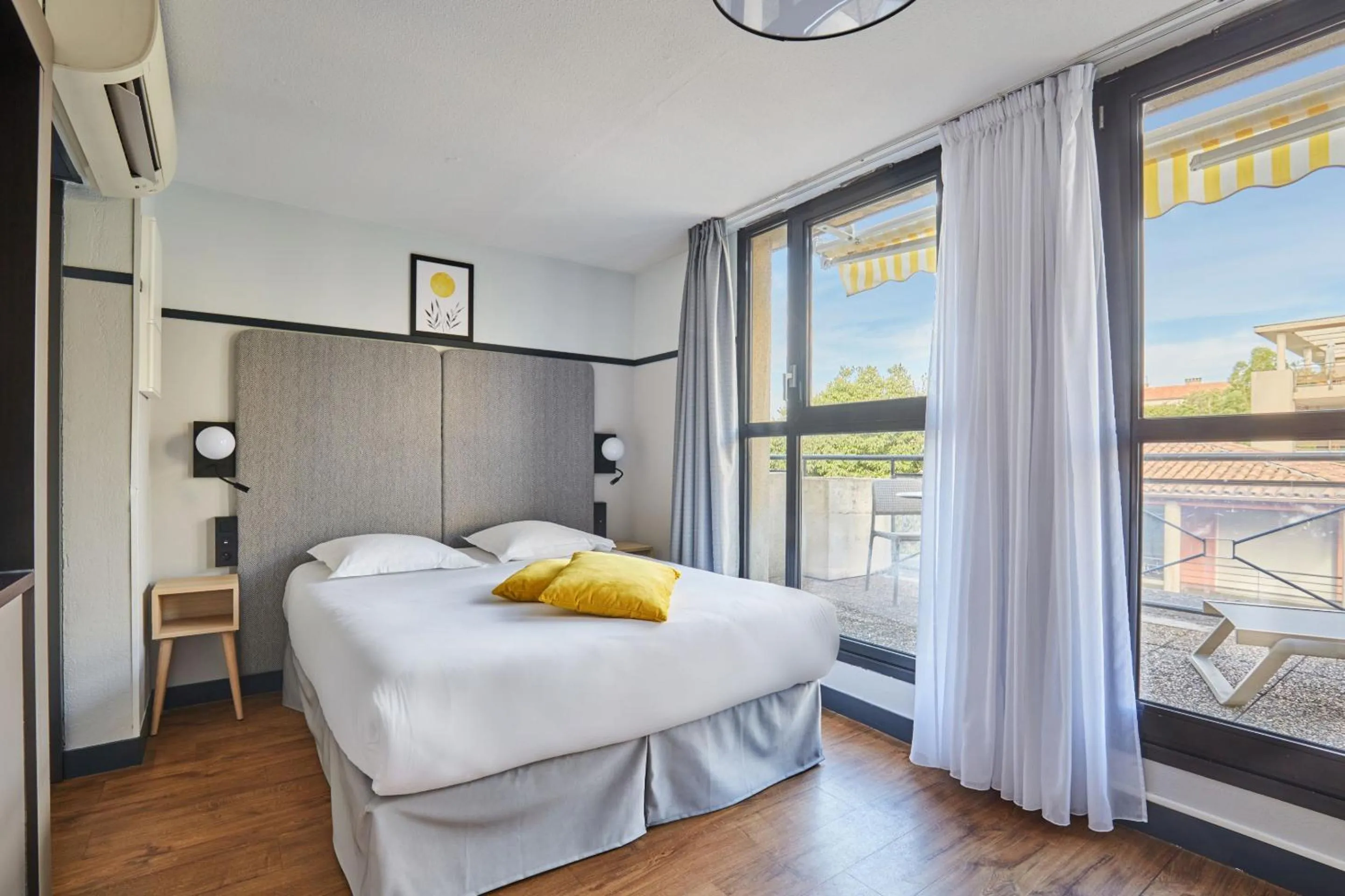 Bedroom, Bed in Appart Hotel Odalys City Aix en Provence Les Floridianes