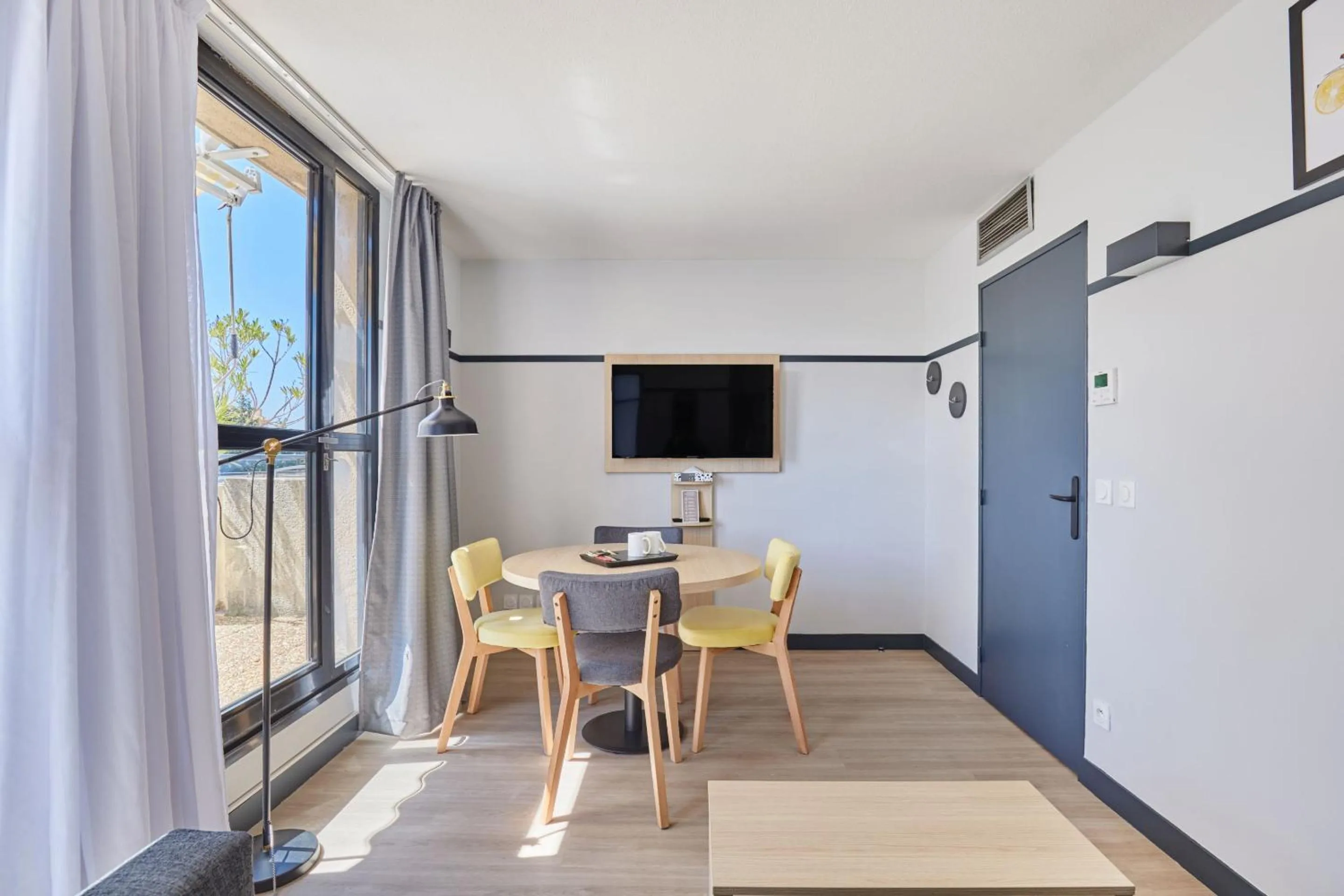 Seating area in Appart Hotel Odalys City Aix en Provence Les Floridianes