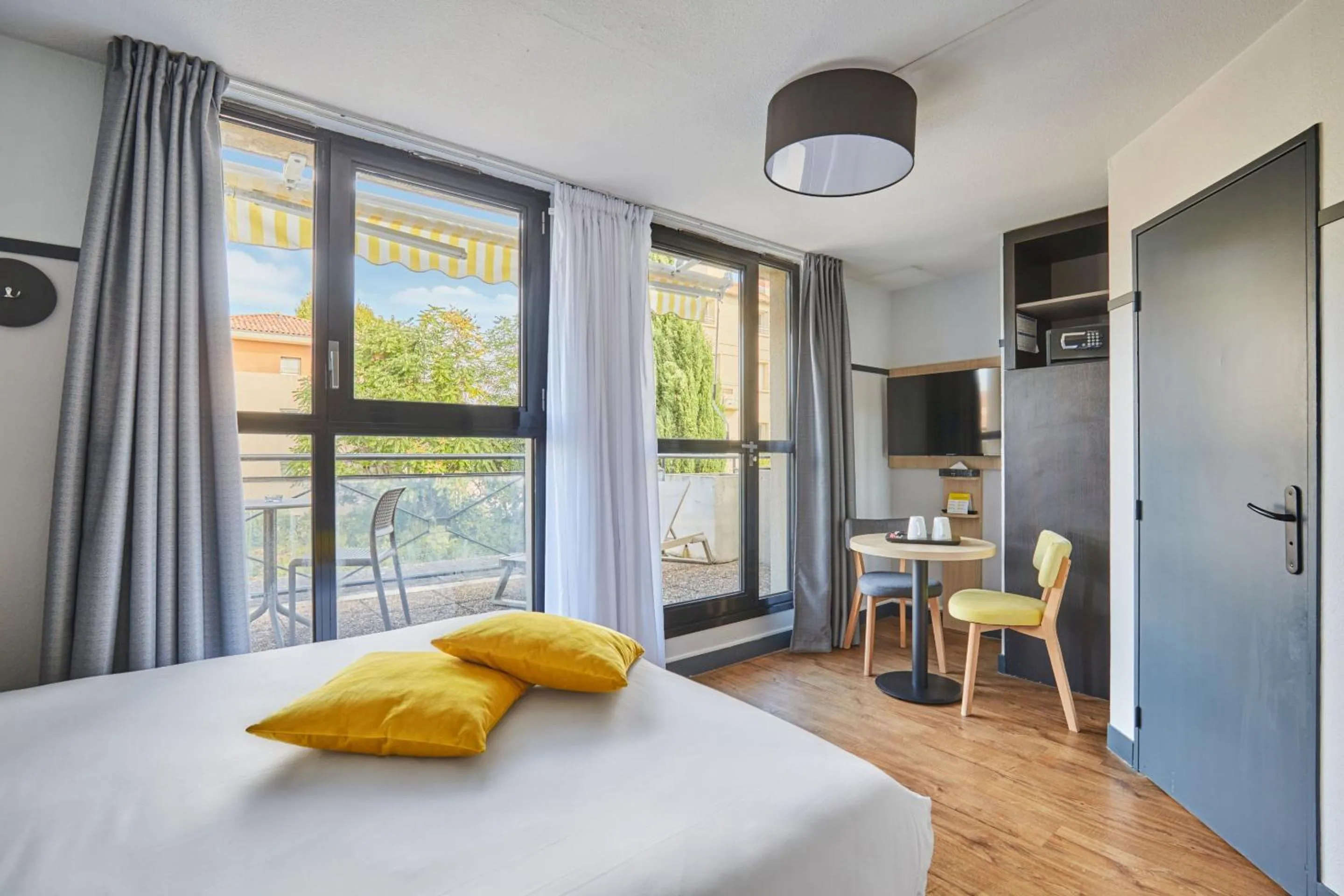 Bedroom, Bed in Appart Hotel Odalys City Aix en Provence Les Floridianes