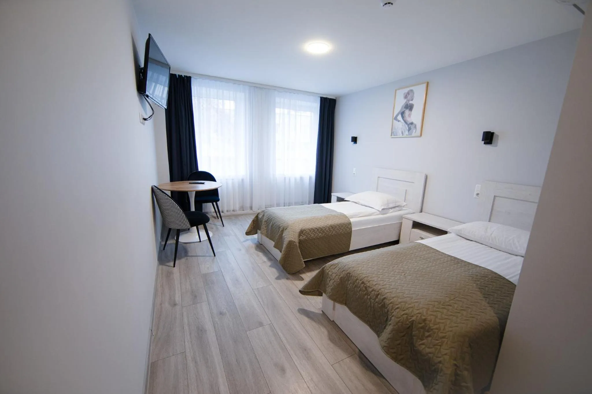 Bed in Dzūkija Hotel