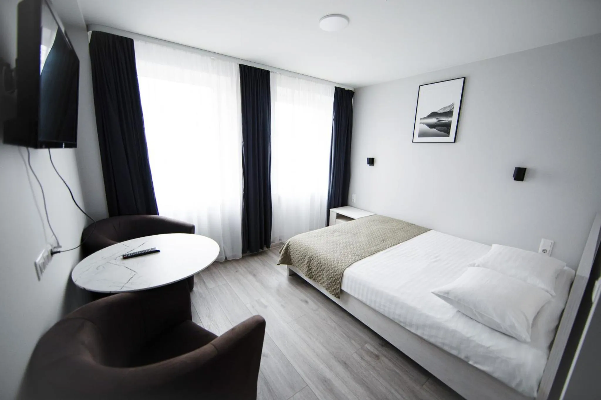 Bed in Dzukija Hotel