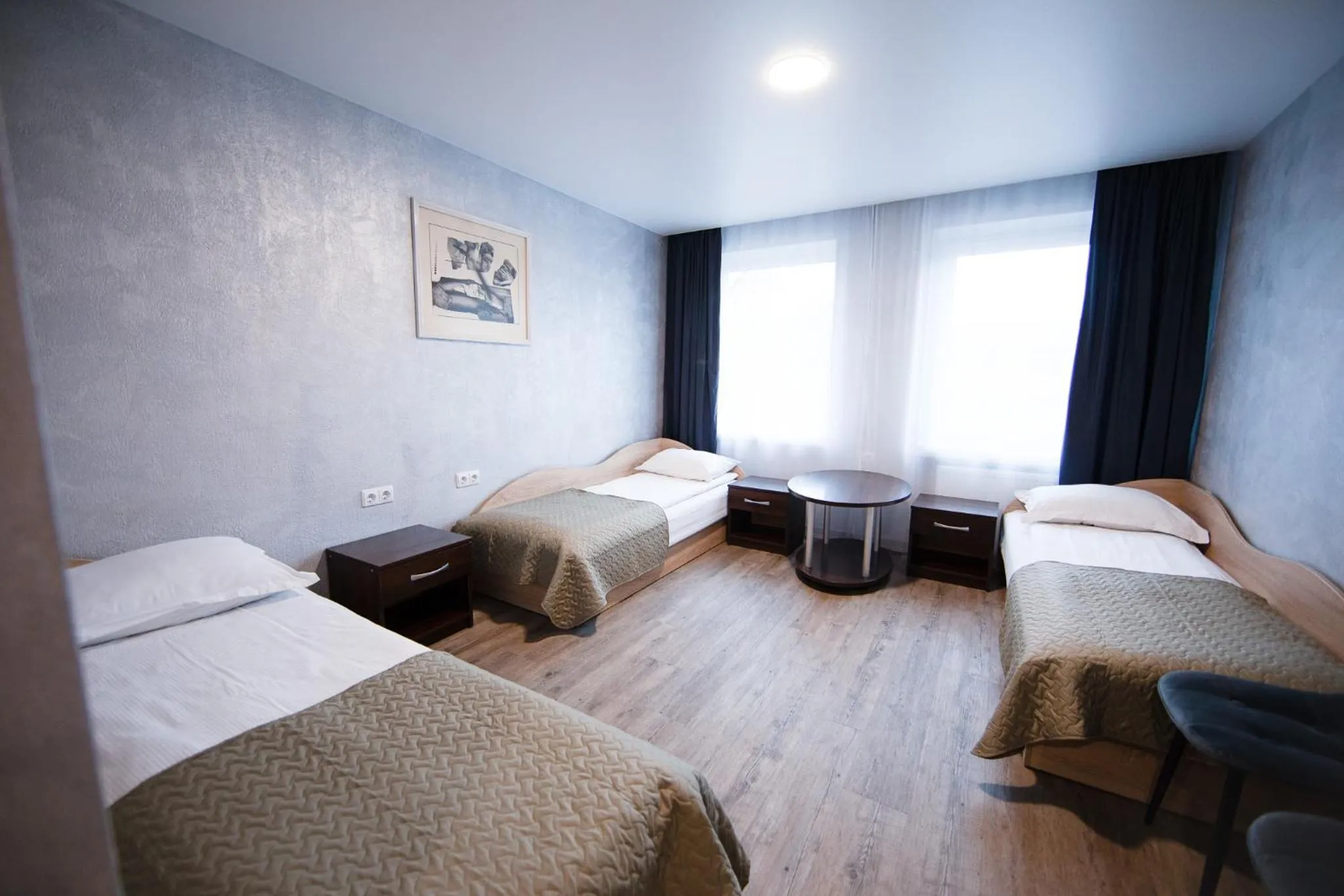 Bed in Dzukija Hotel