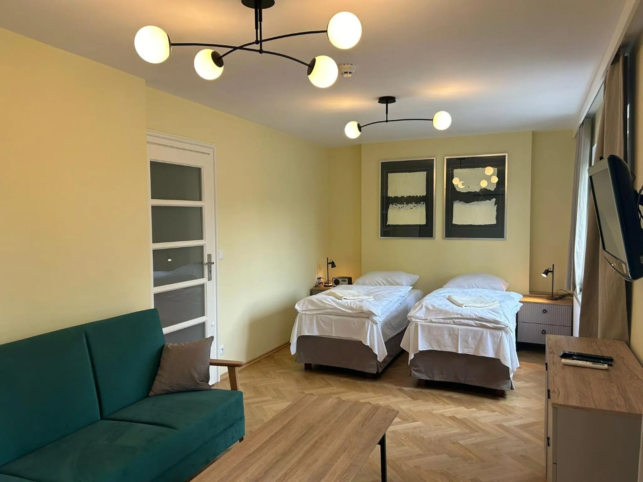 Bed in Cybulskiego Guest Rooms