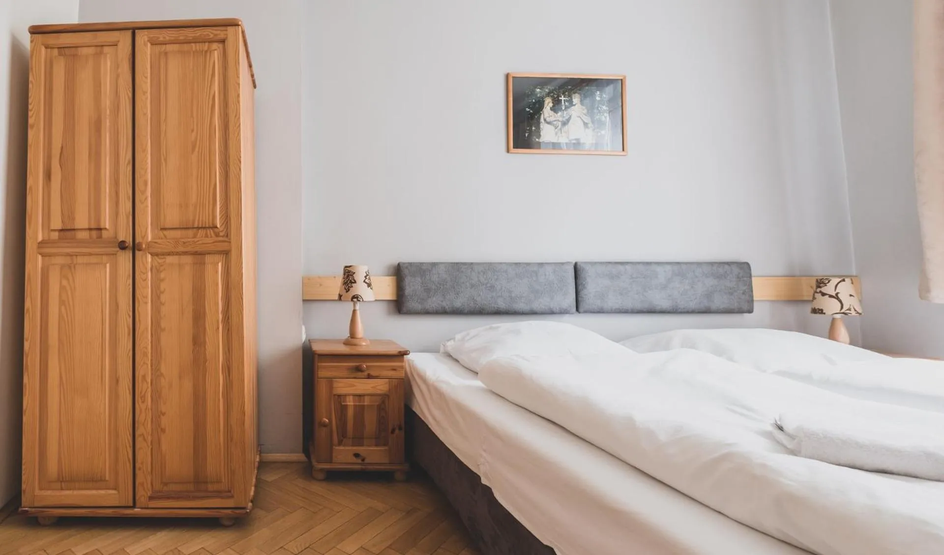 Bed in Cybulskiego Guest Rooms