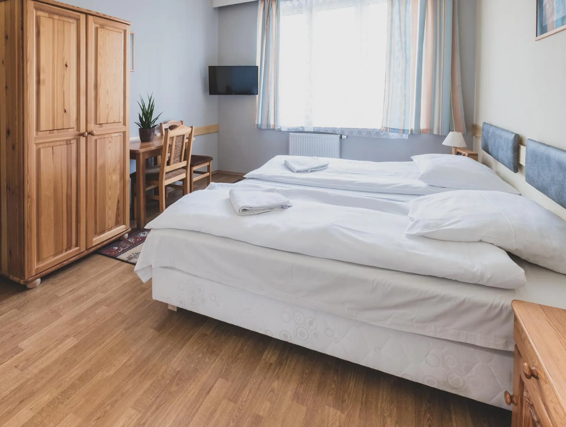 Bed in Cybulskiego Guest Rooms