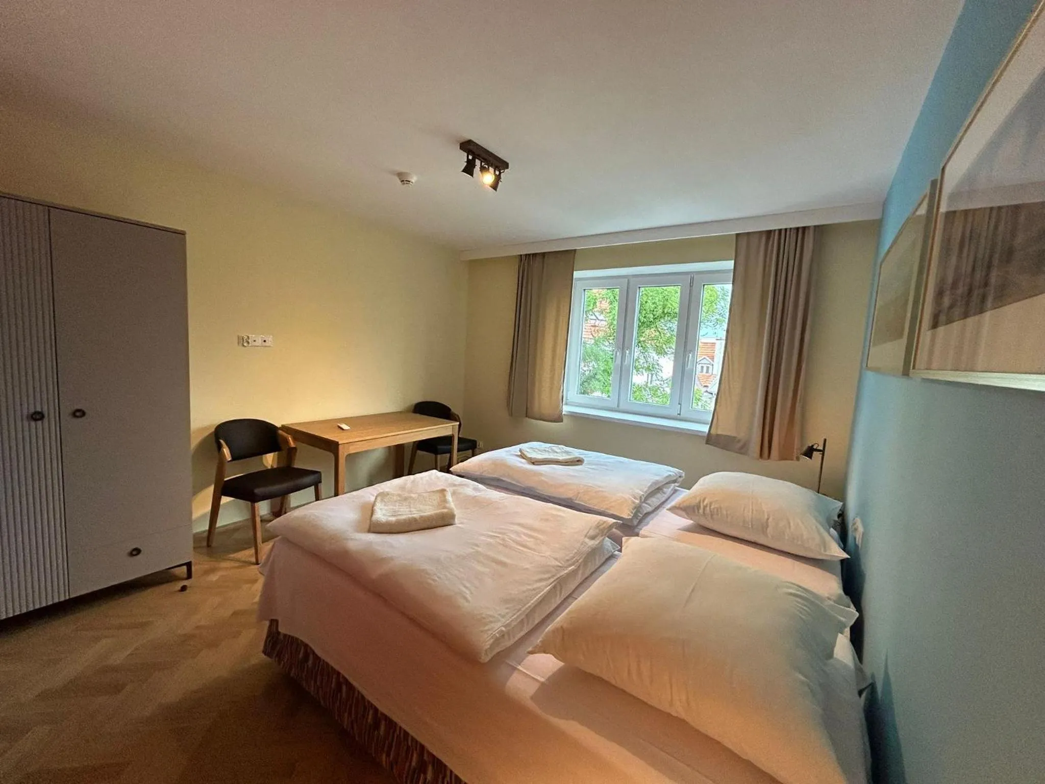 Bed in Cybulskiego Guest Rooms