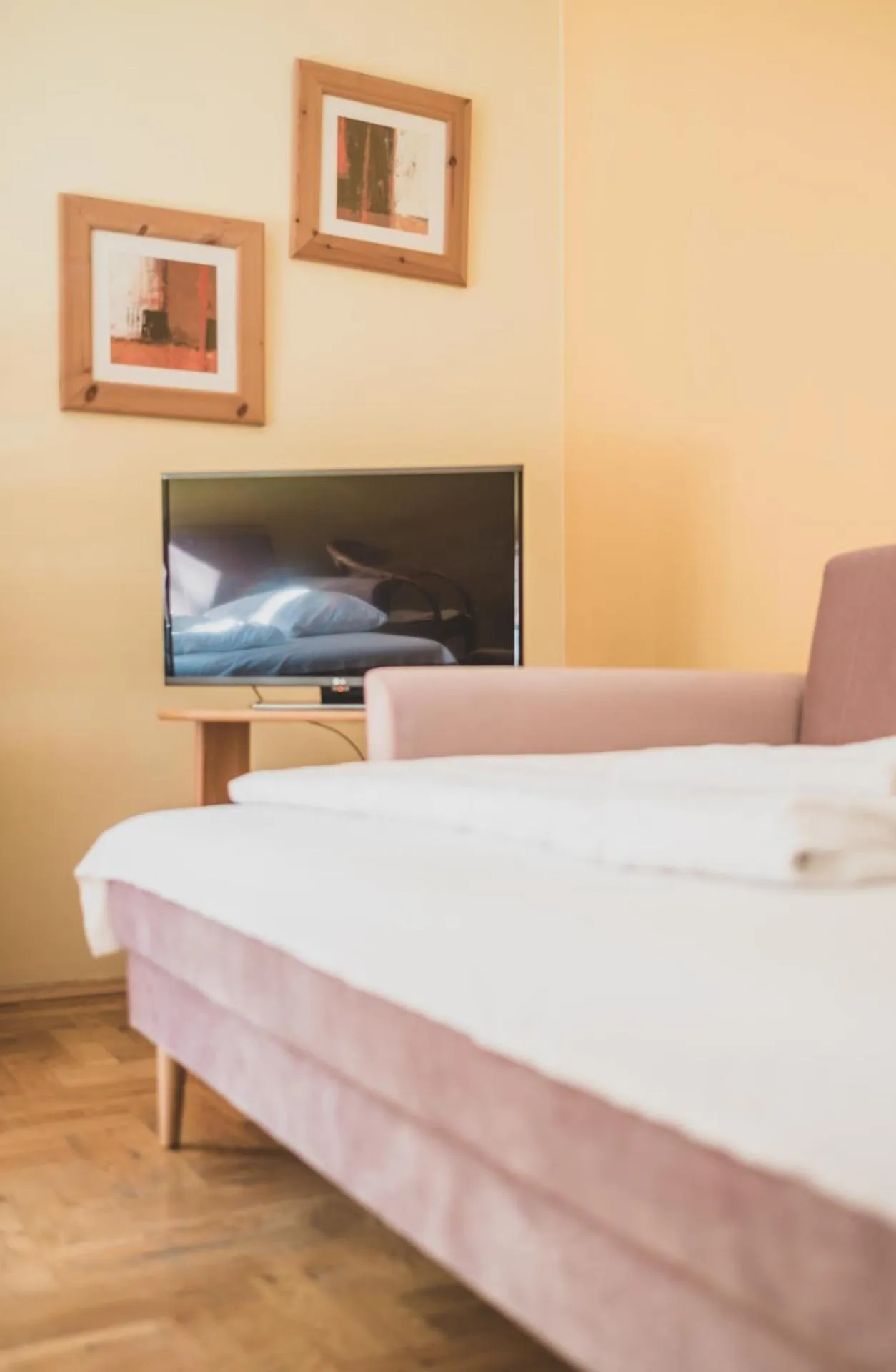 Bed in Cybulskiego Guest Rooms