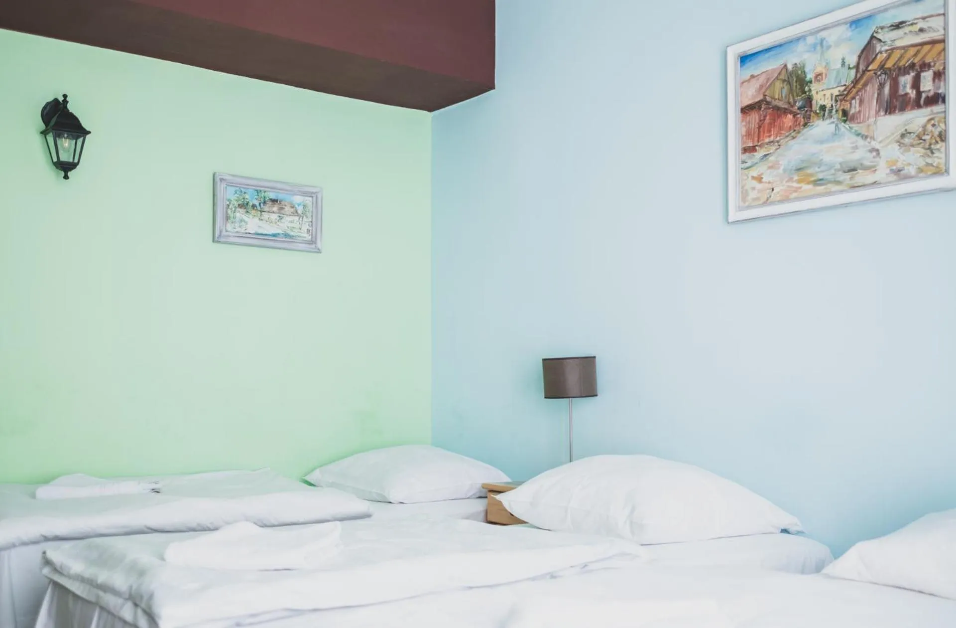 Bed in Cybulskiego Guest Rooms