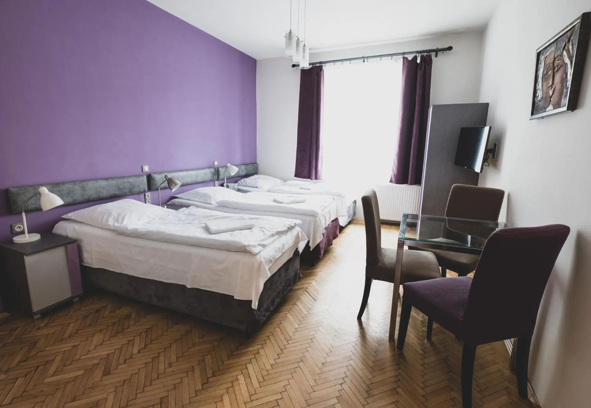 Bed in Cybulskiego Guest Rooms