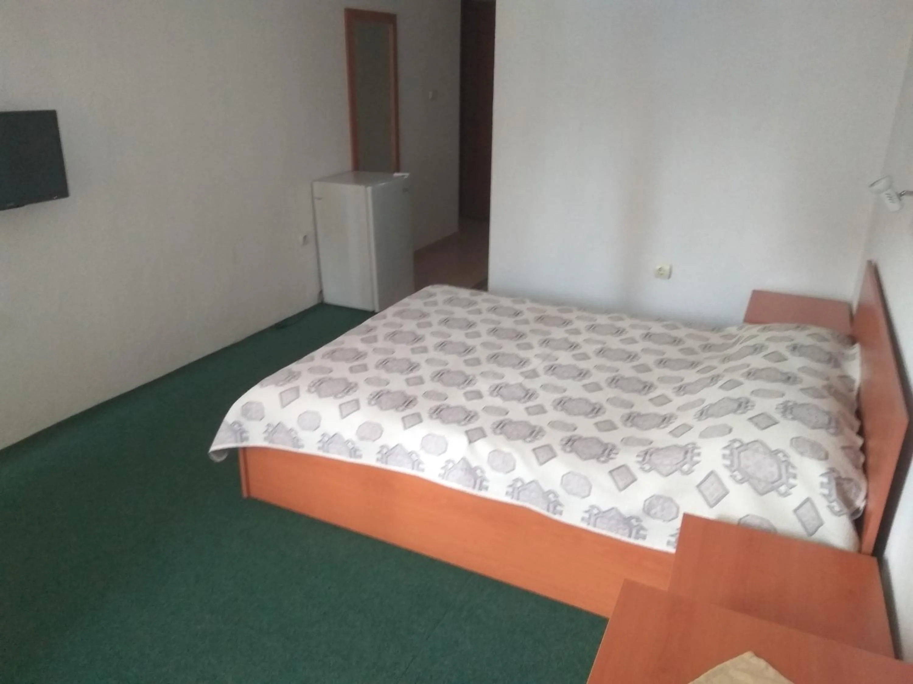 Bed in Family Hotel Blazhi