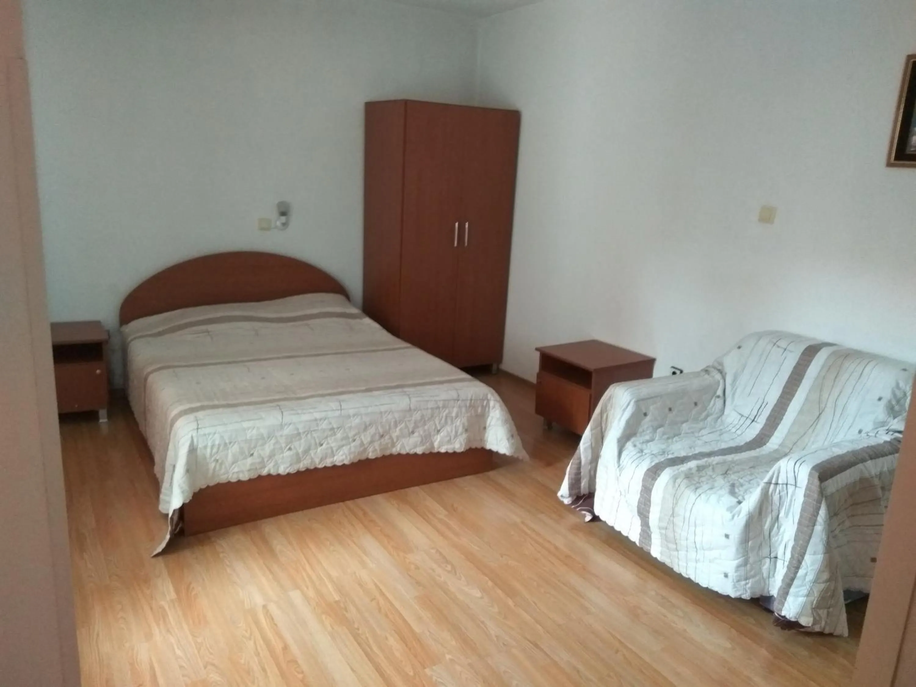 Bed in Family Hotel Blazhi