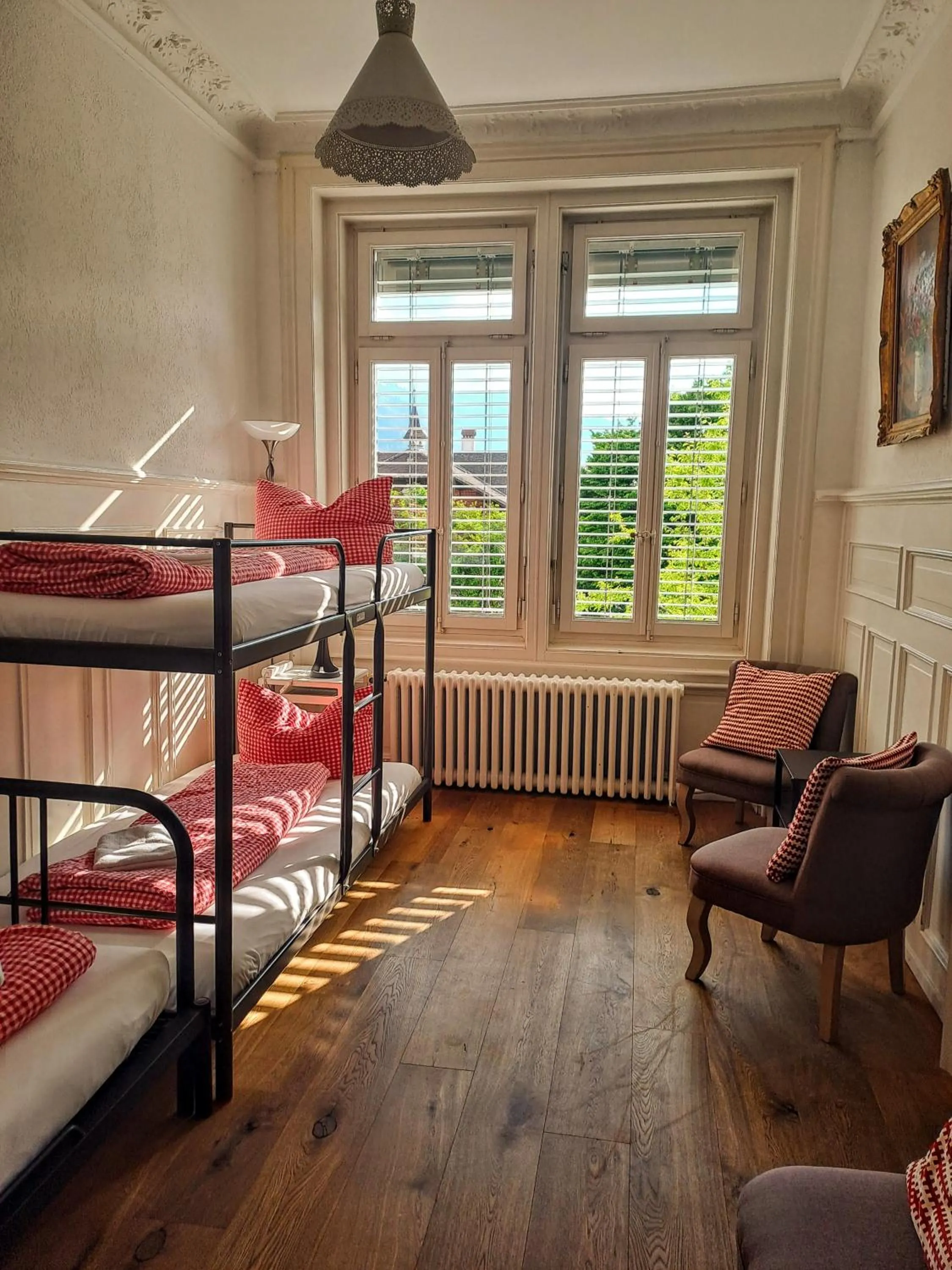 Seating area, Bed in Adventure Hostel Interlaken