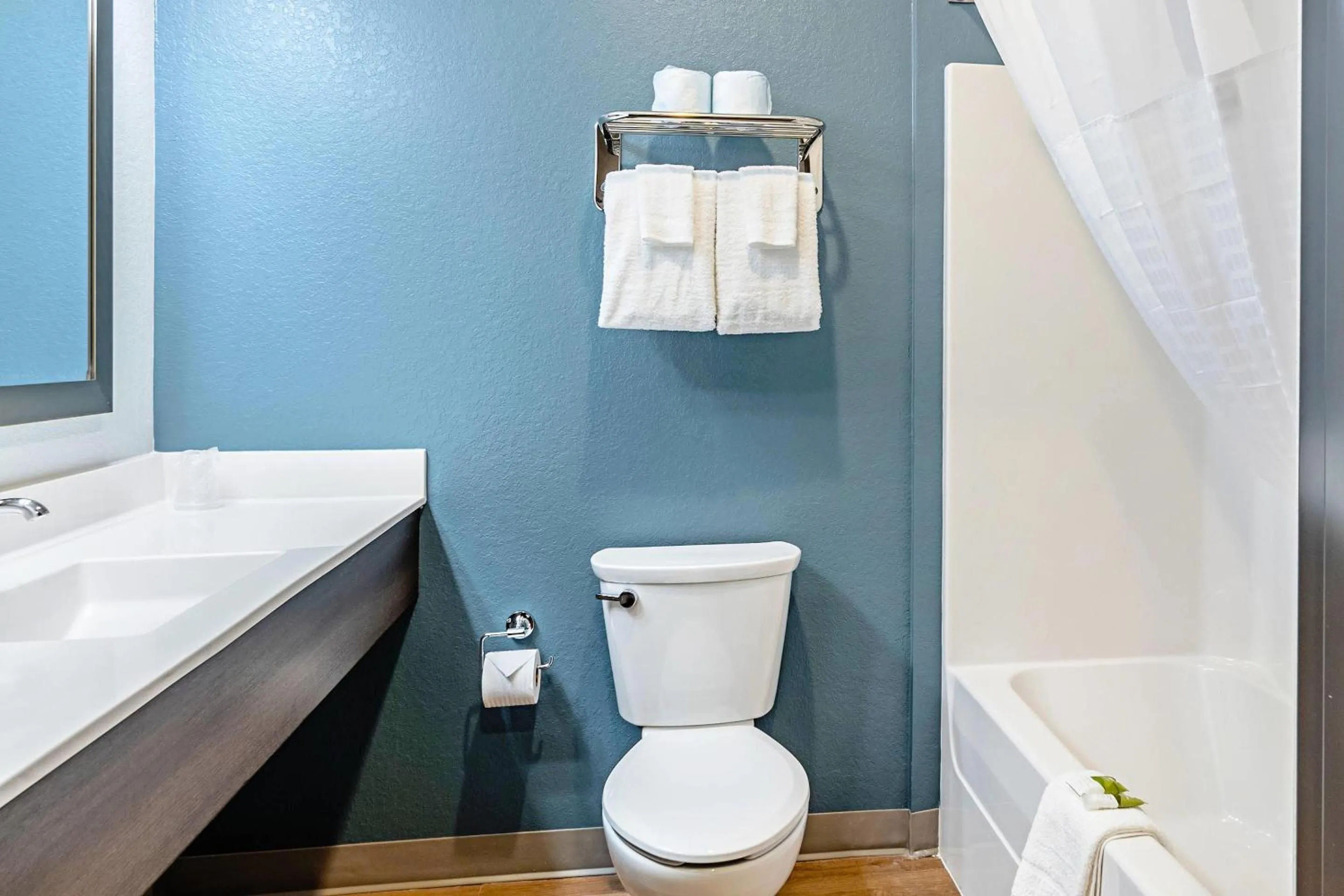 Bedroom in WoodSpring Suites Naples