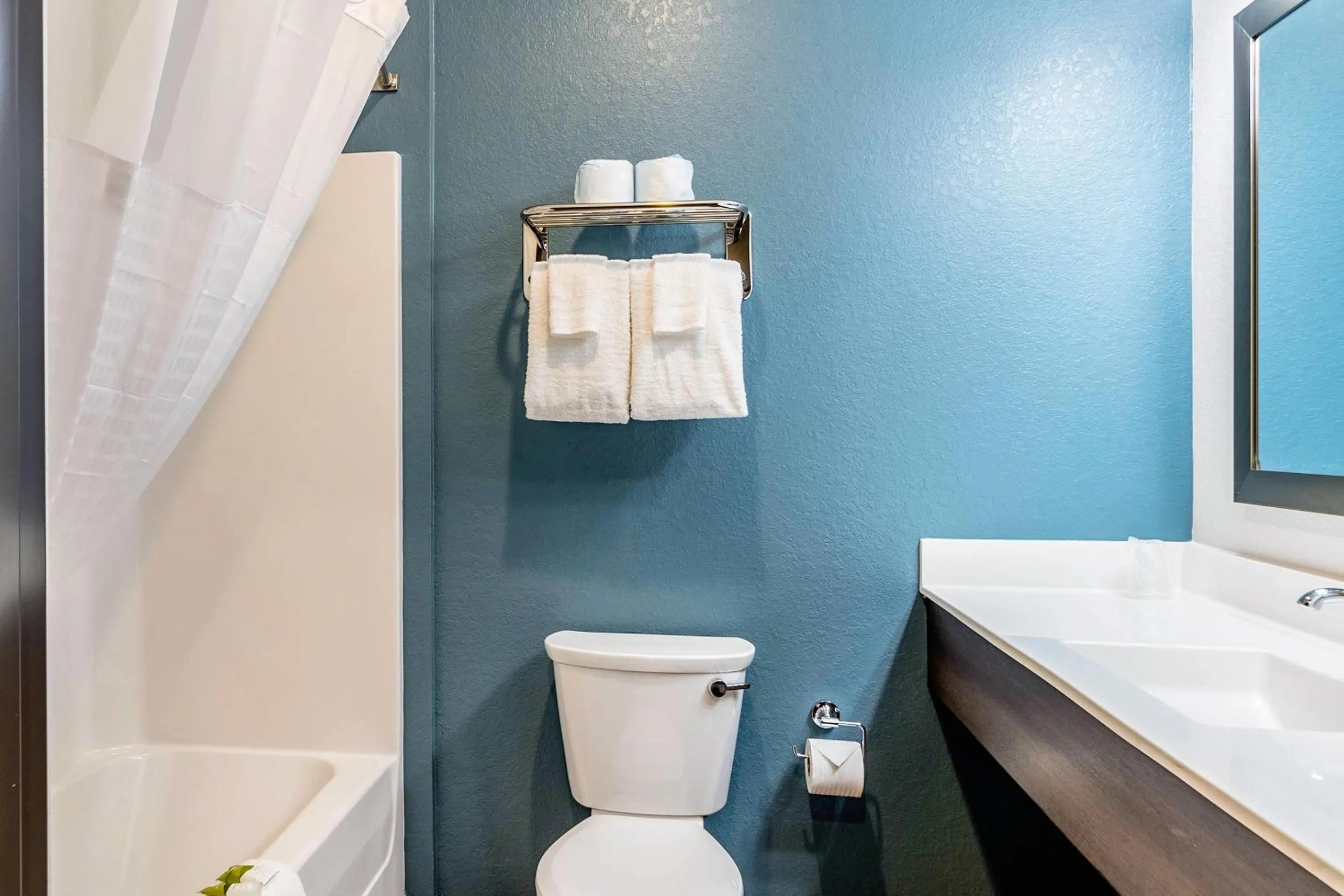 Bedroom in WoodSpring Suites Naples