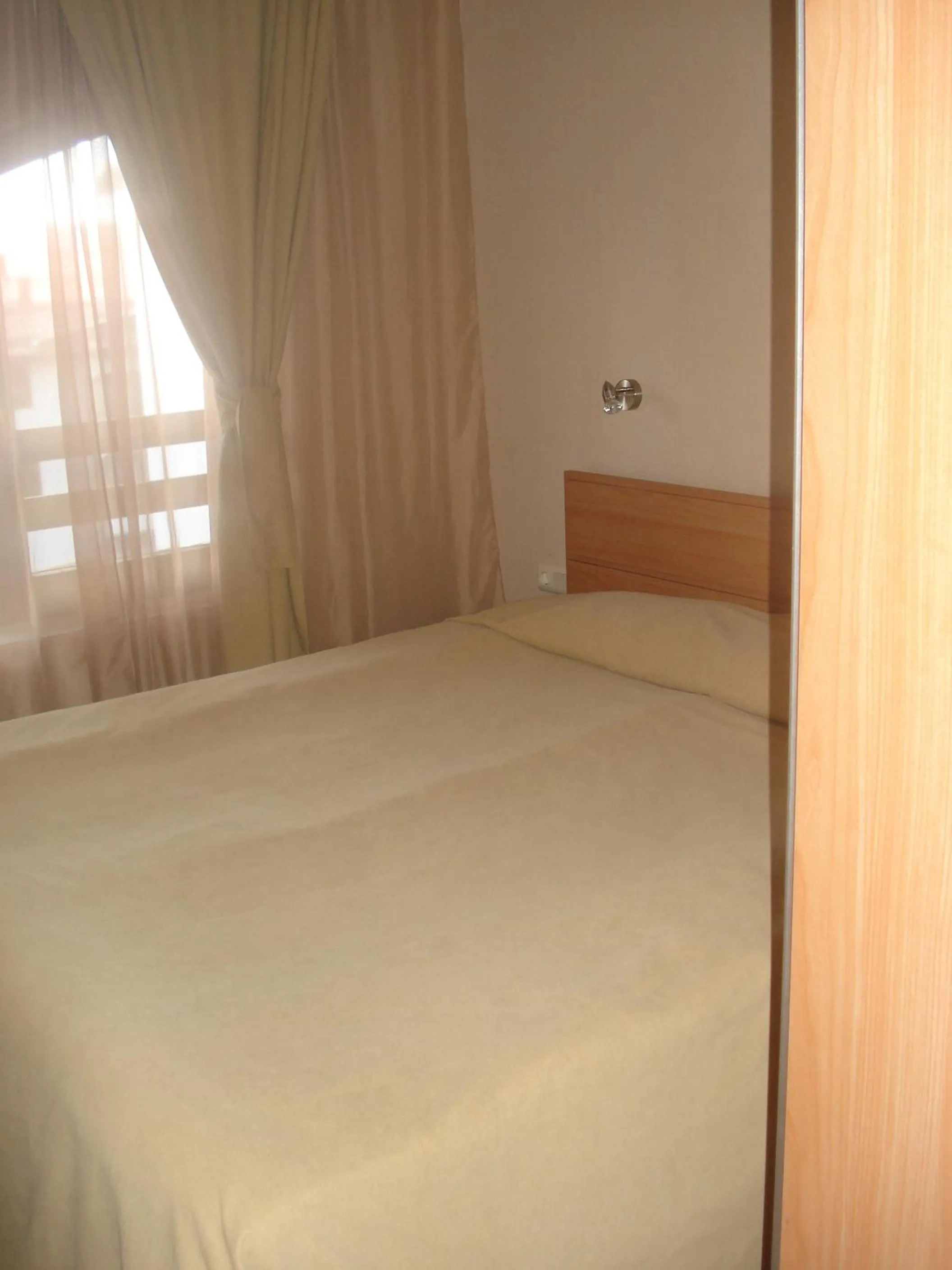 Bed in Snezhanka Apartments TMF