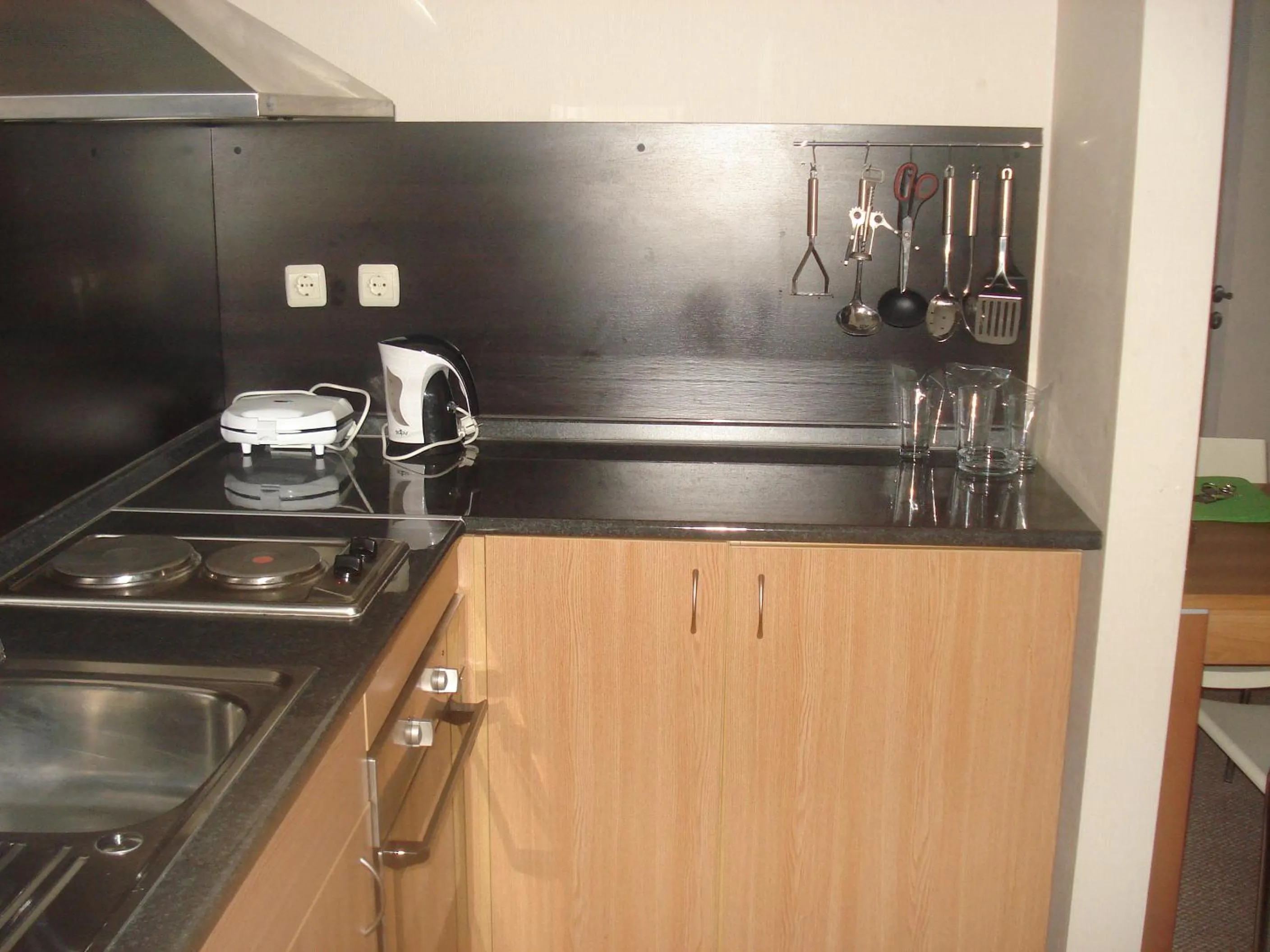 Kitchen or kitchenette in Snezhanka Apartments TMF