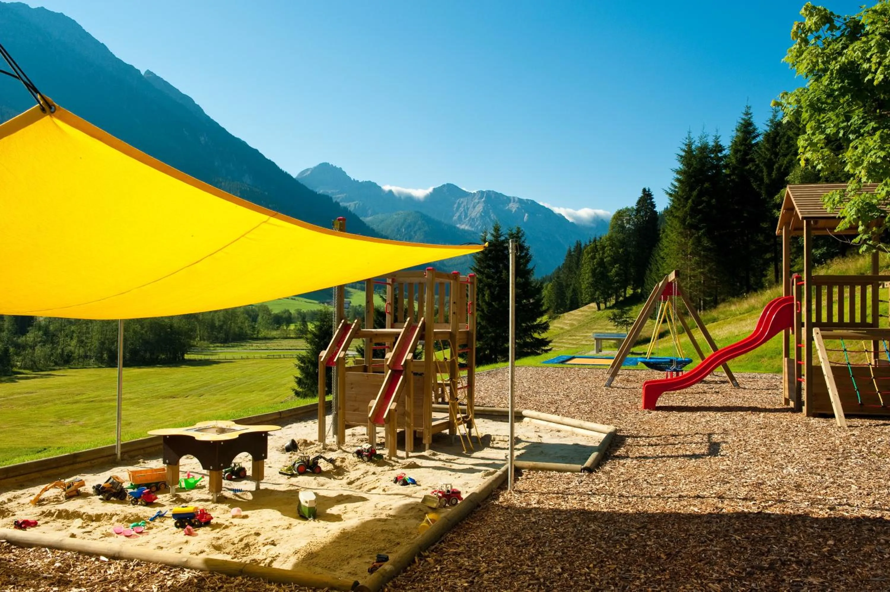 Children play ground in Wellness-Aparthotel Montana