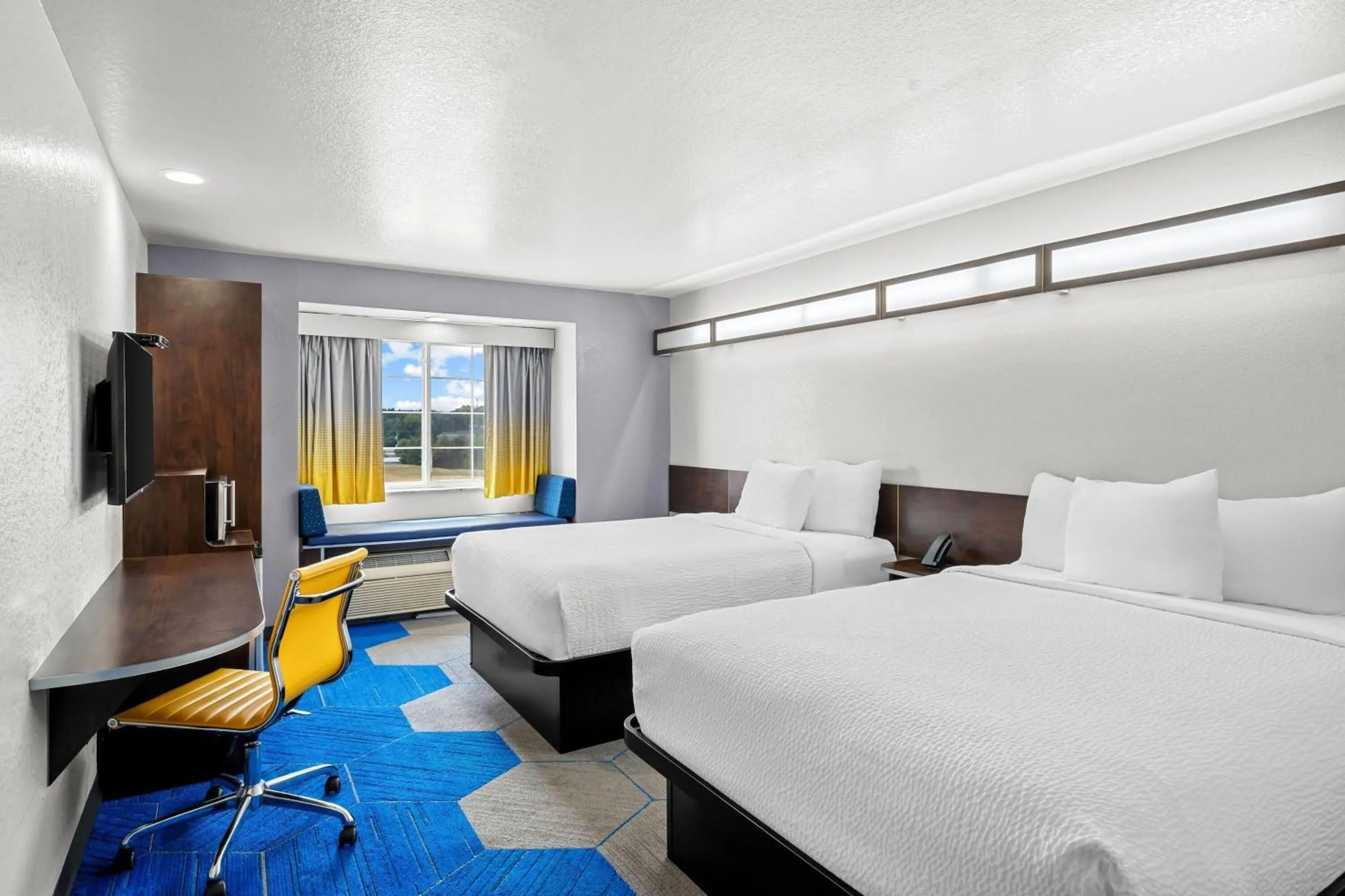 Bed in Microtel Inn & Suites by Wyndham Searcy