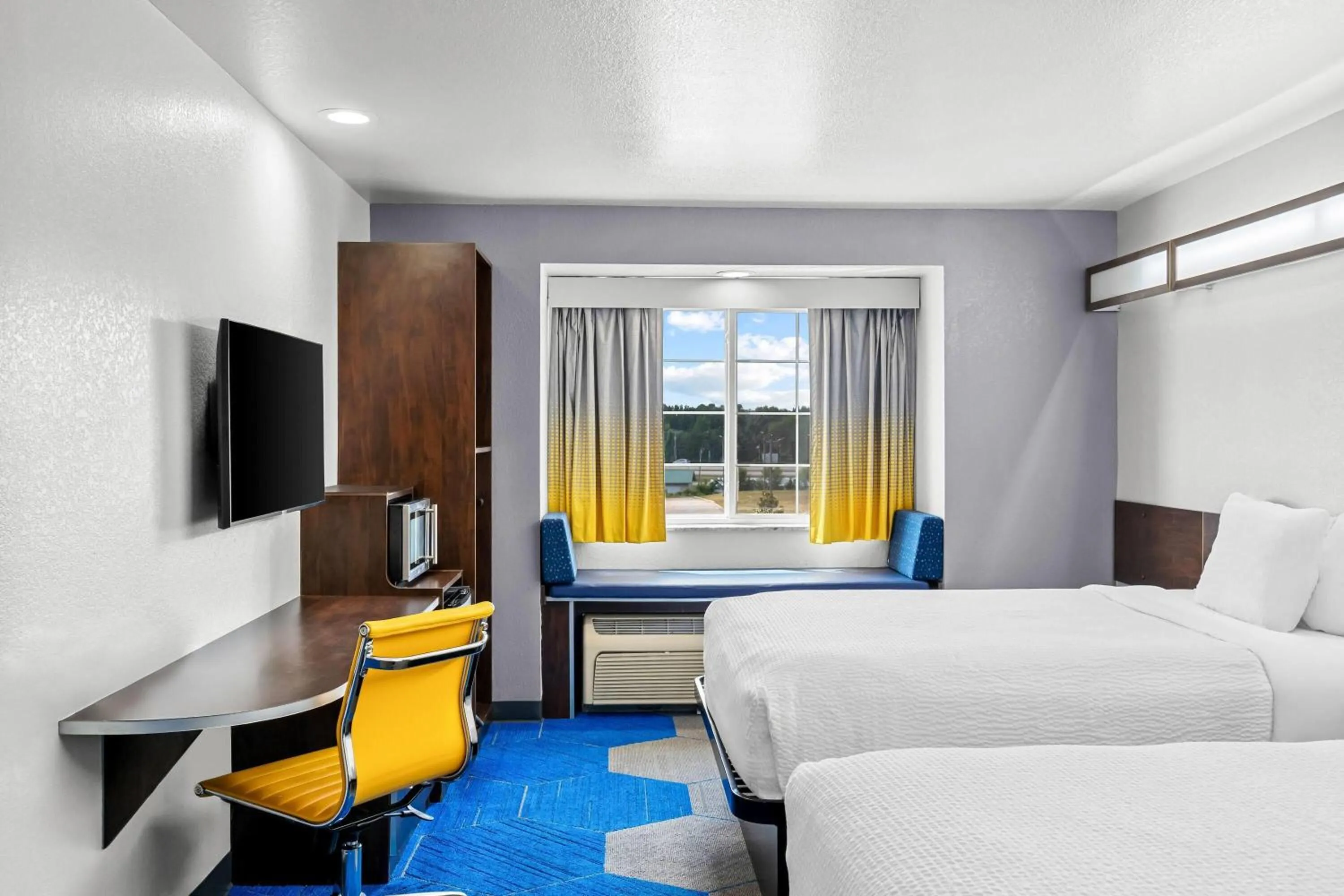 Bed in Microtel Inn & Suites by Wyndham Searcy