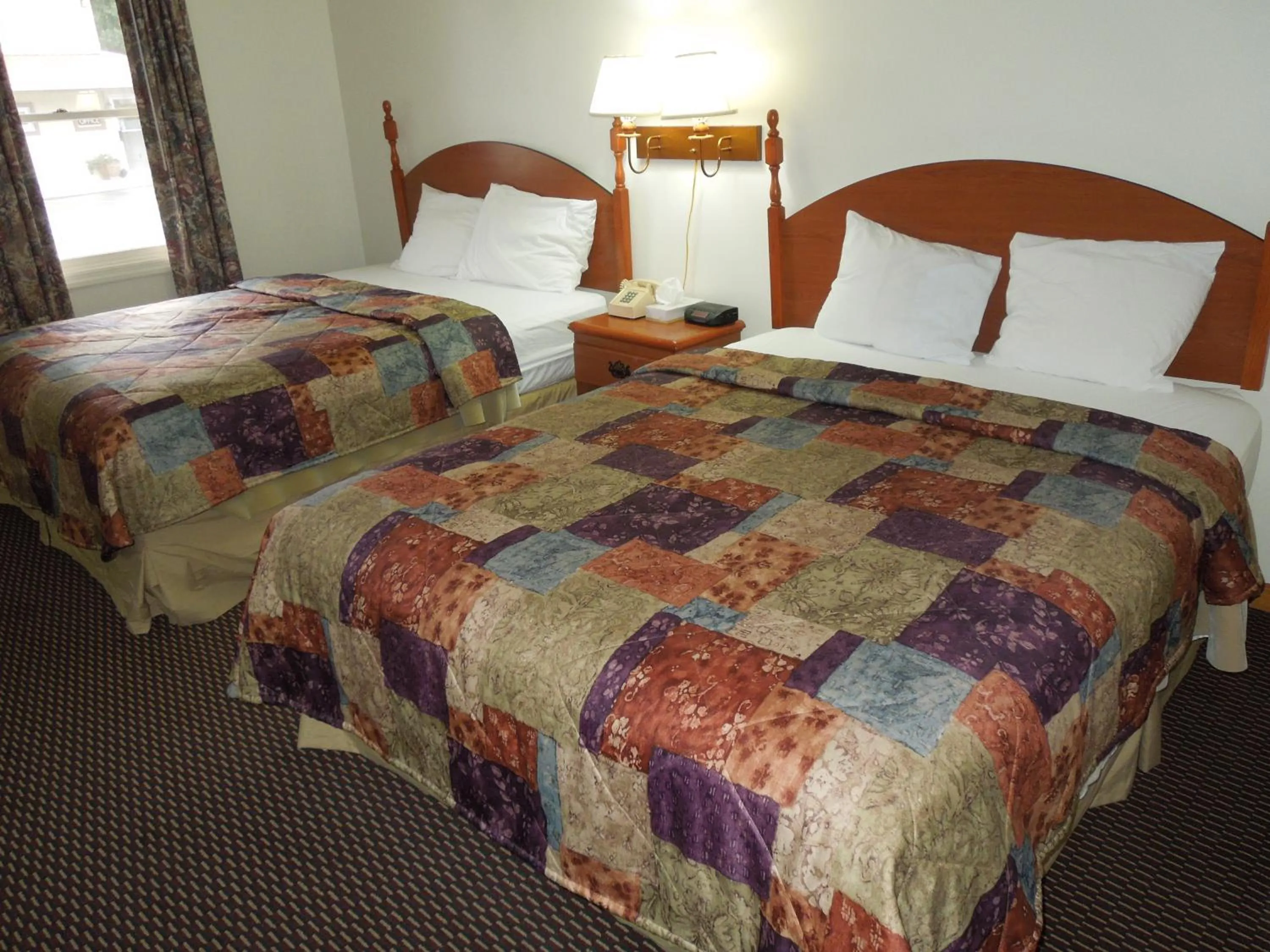 Bed in Red Carpet Inn Ronks