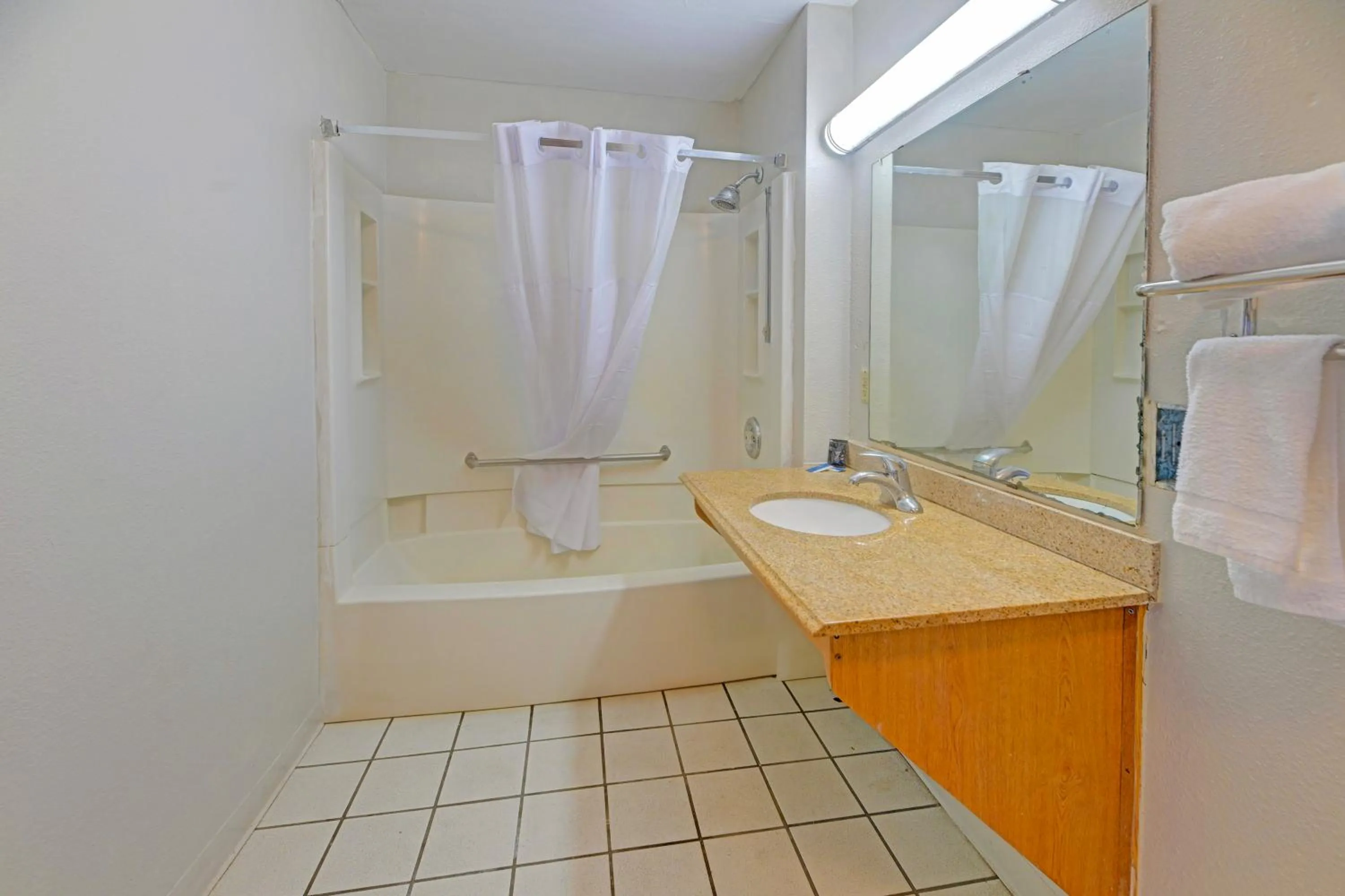 Bathroom in Travelers inn by OYO Wichita Falls