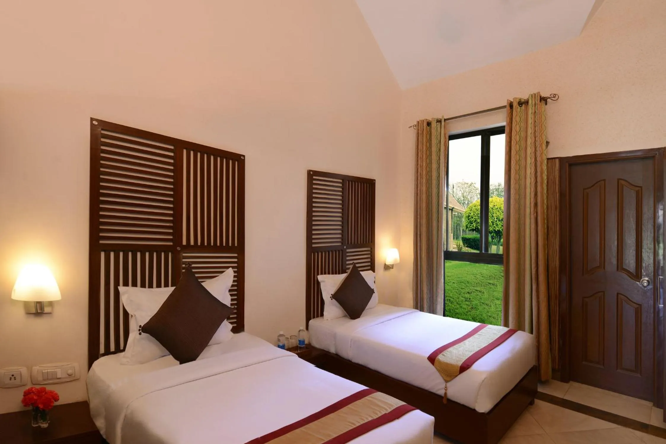 Photo of the whole room, Bed in Shri Radha Brij Vasundhara Resort & Spa