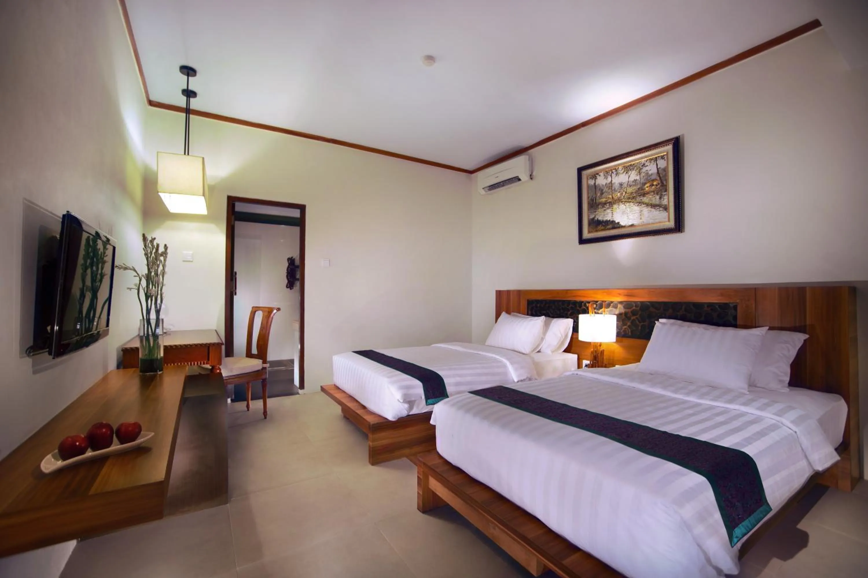 Bedroom, Bed in Aston Sunset Beach Resort - Gili Trawangan
