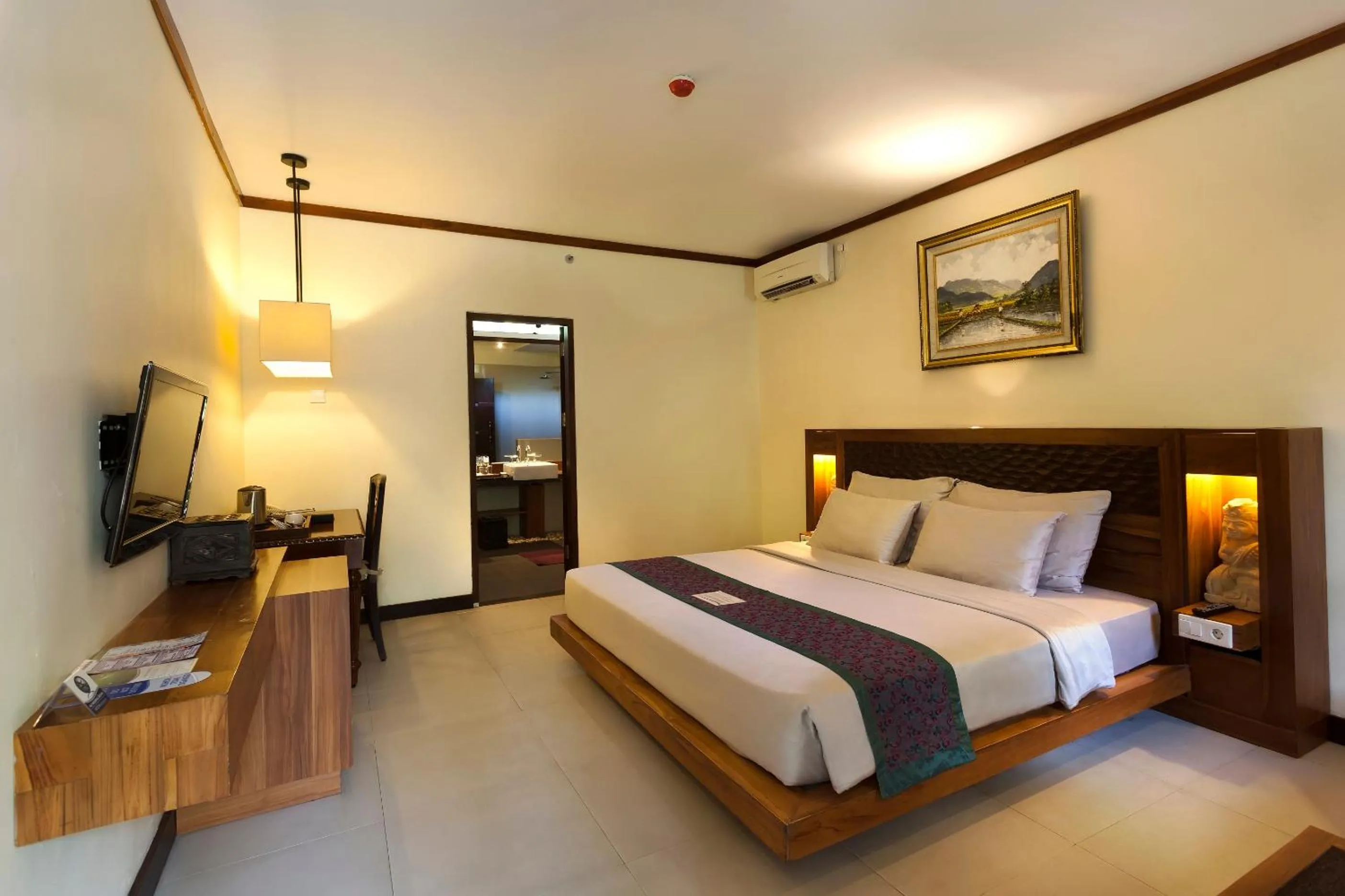 Bedroom, Bed in Aston Sunset Beach Resort - Gili Trawangan