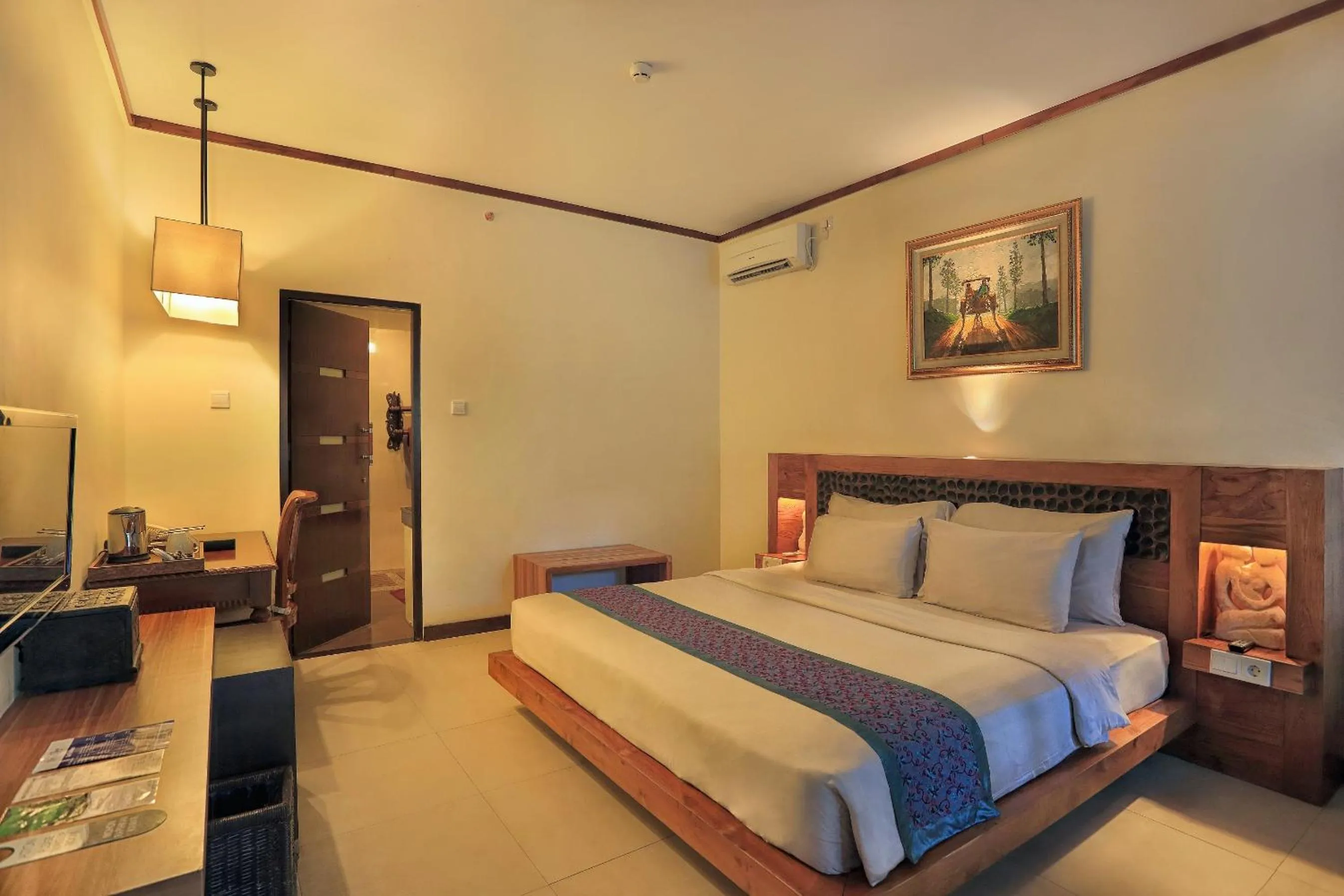 Bedroom, Bed in Aston Sunset Beach Resort - Gili Trawangan