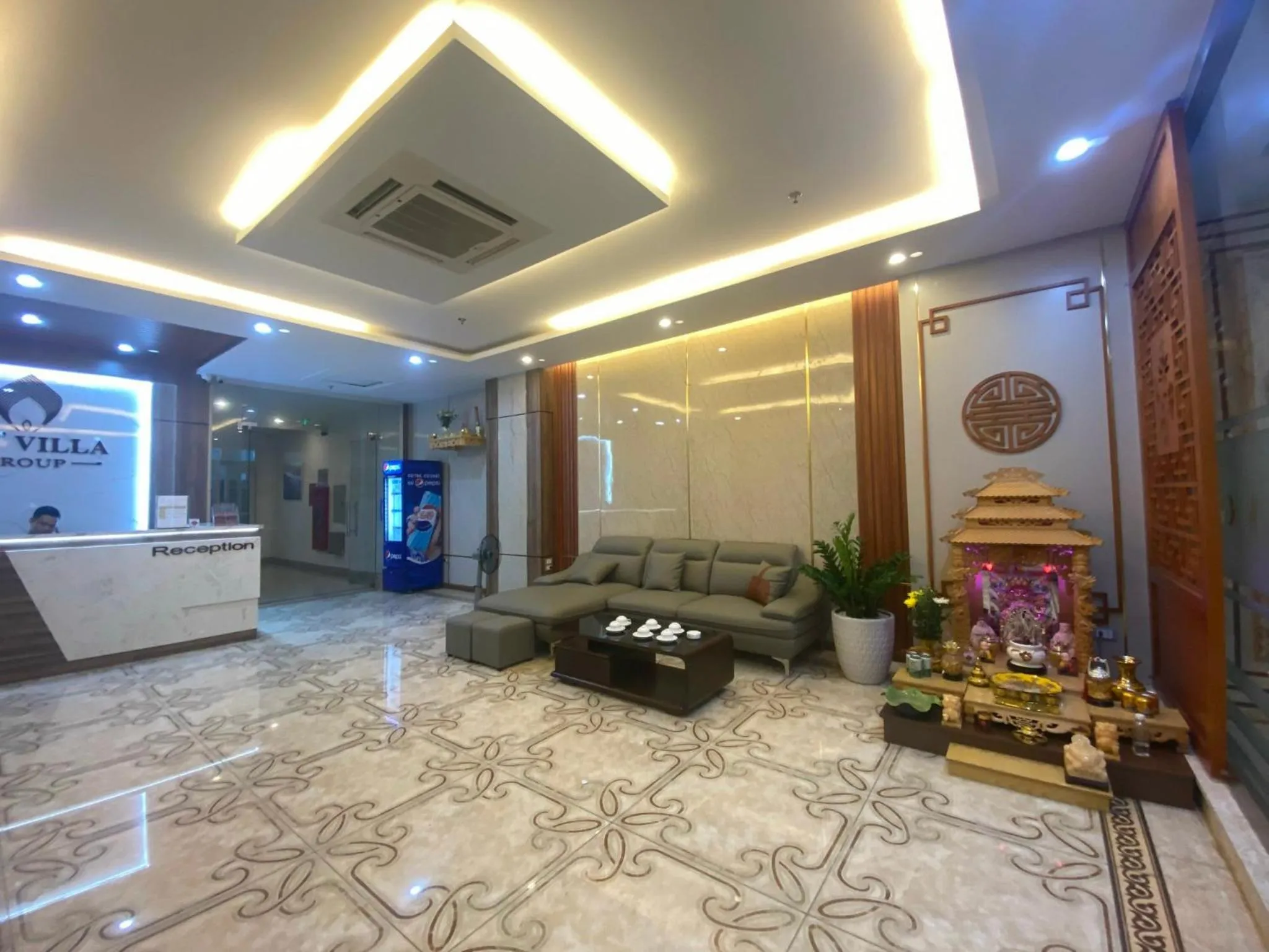 Communal lounge/ TV room in Win Villa Hotel & Apartment