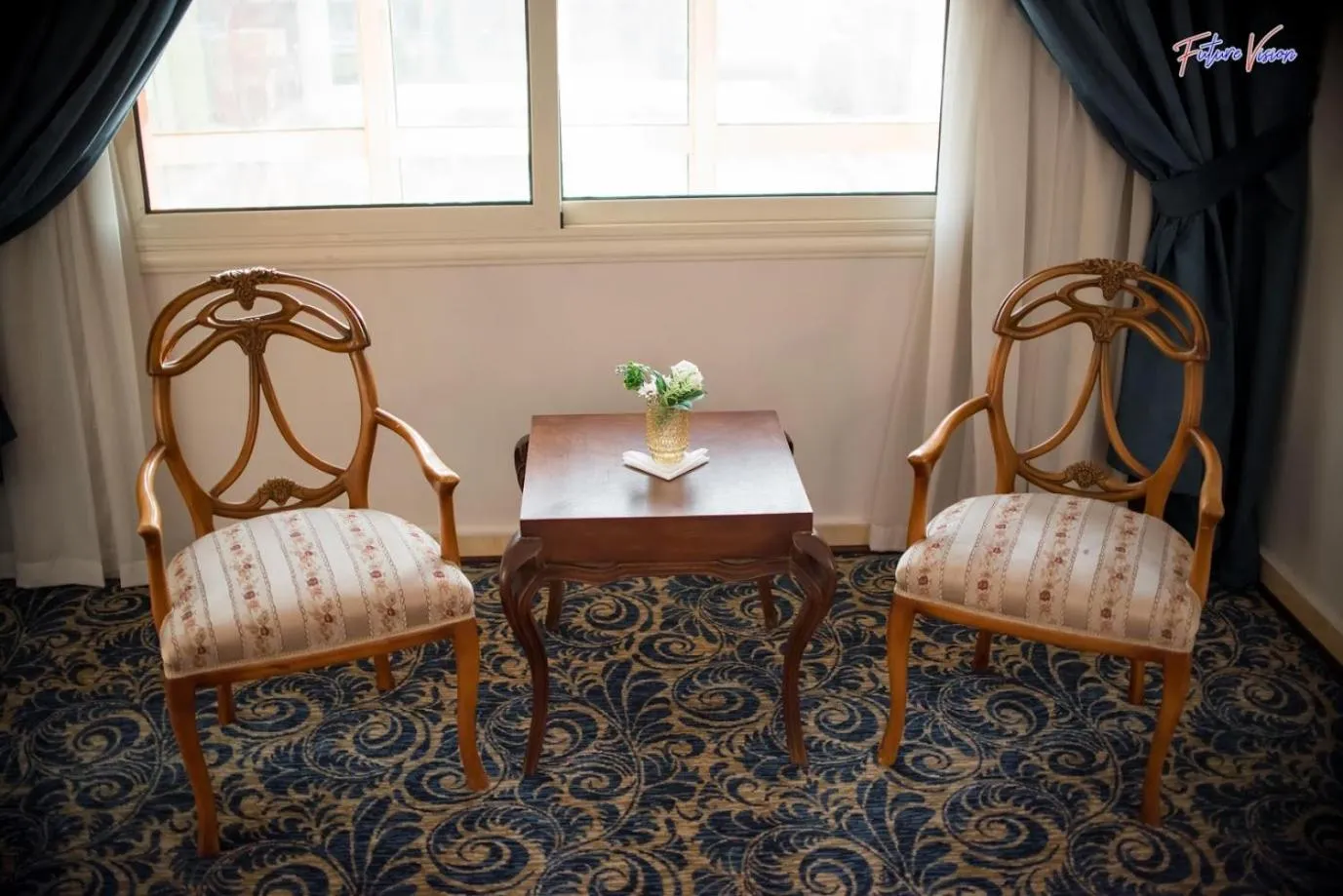 Seating area in Rehana Plaza Hotel