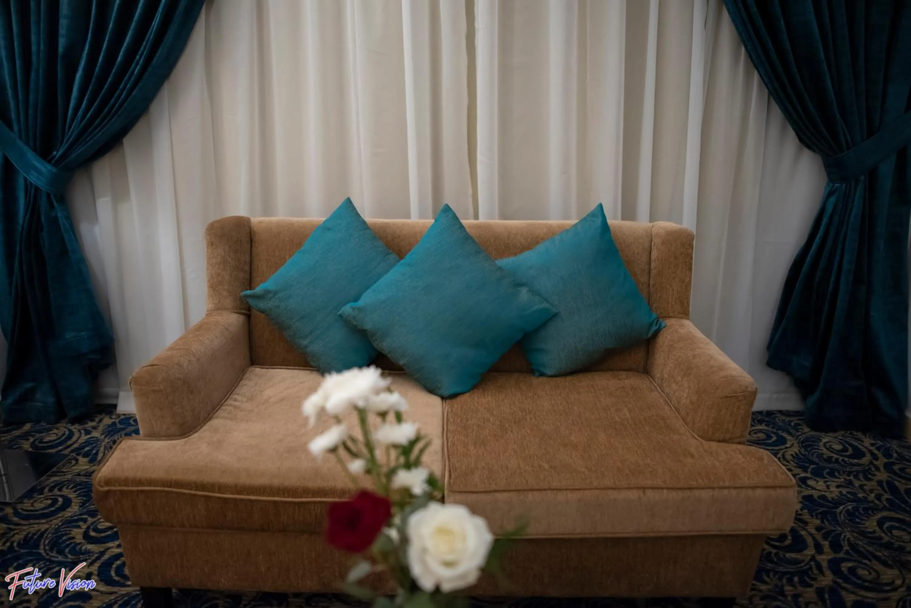 Seating area in Rehana Plaza Hotel