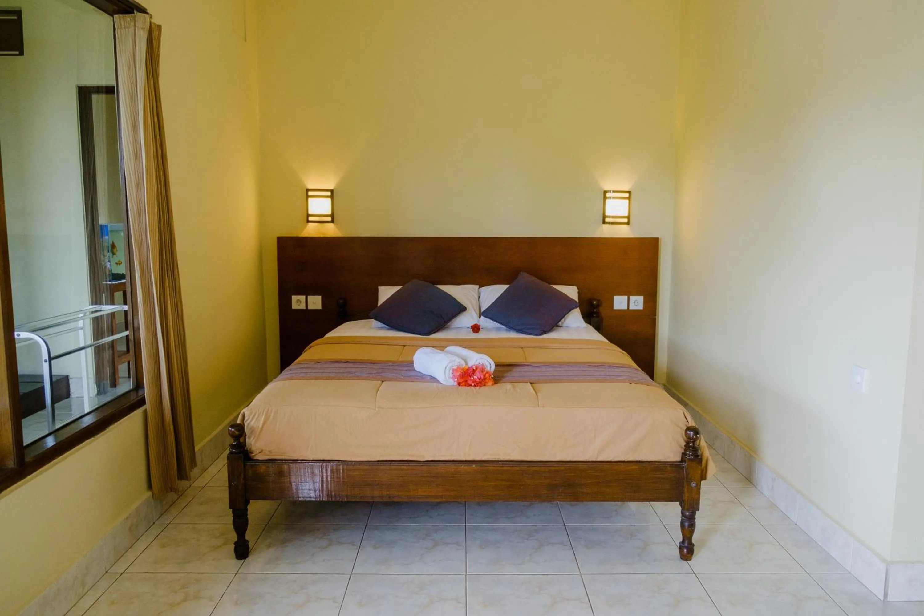 Bed in Desak Putu Putra Home Stay