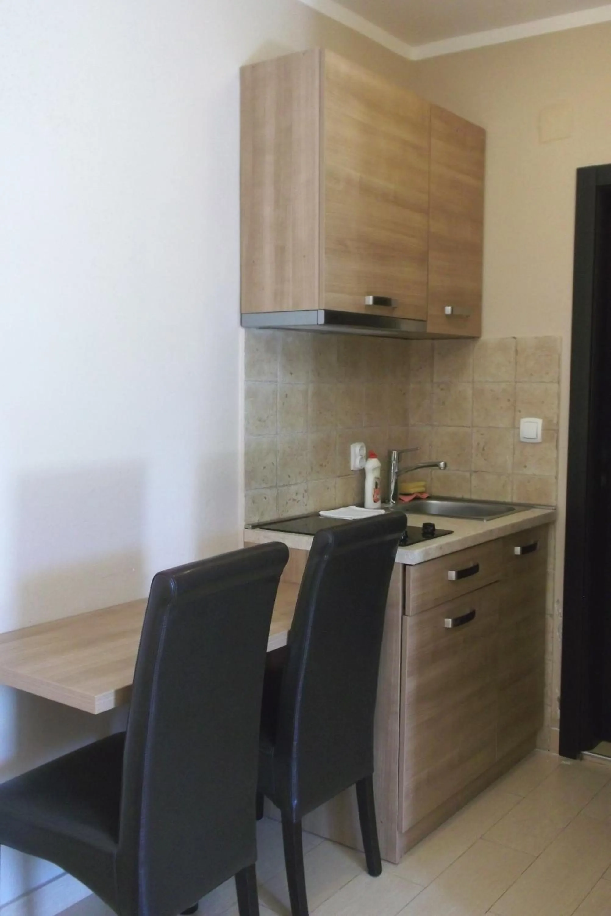 Kitchen or kitchenette in Vila V Lux Apartments