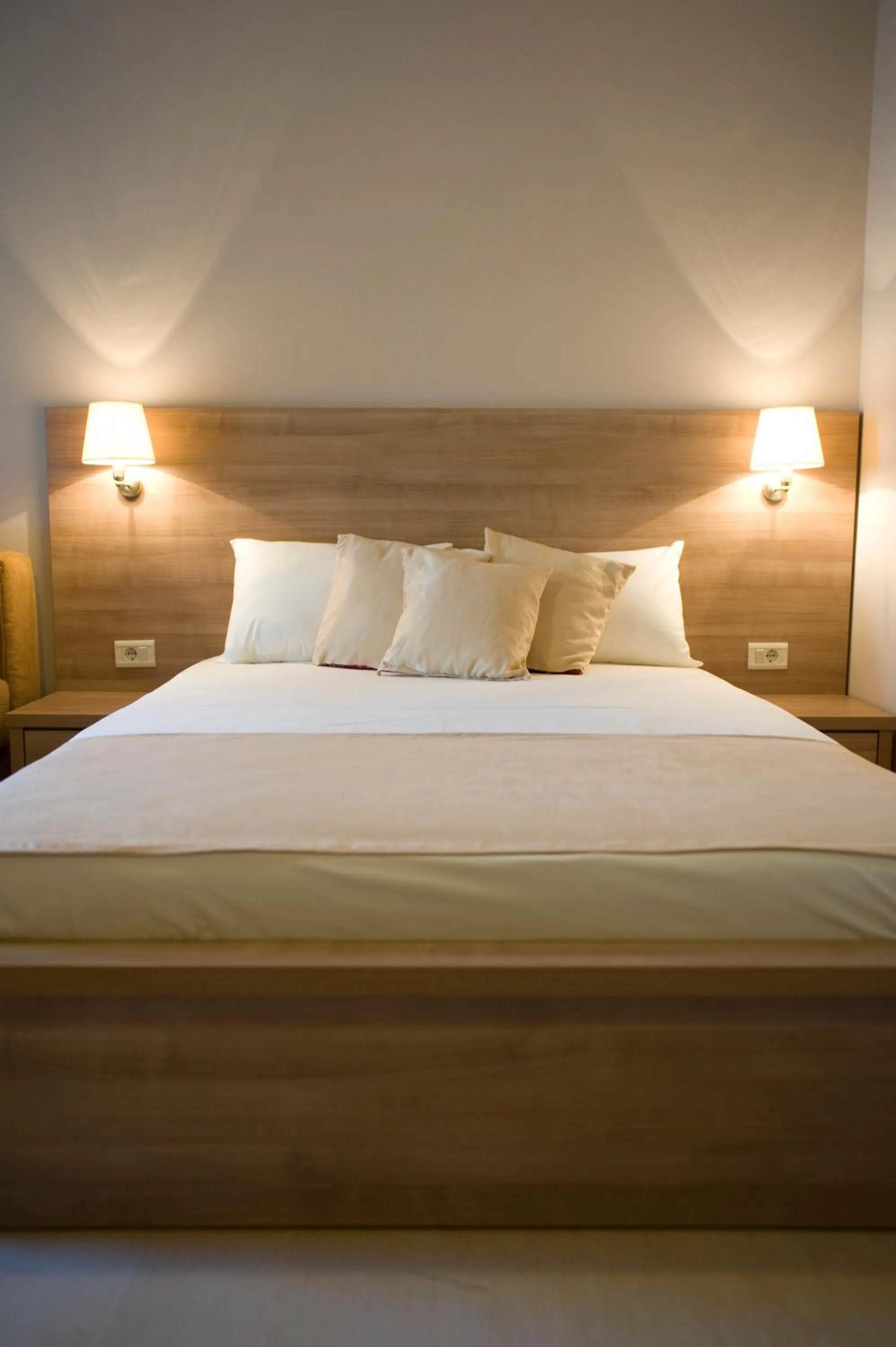 Bed in Vila V Lux Apartments