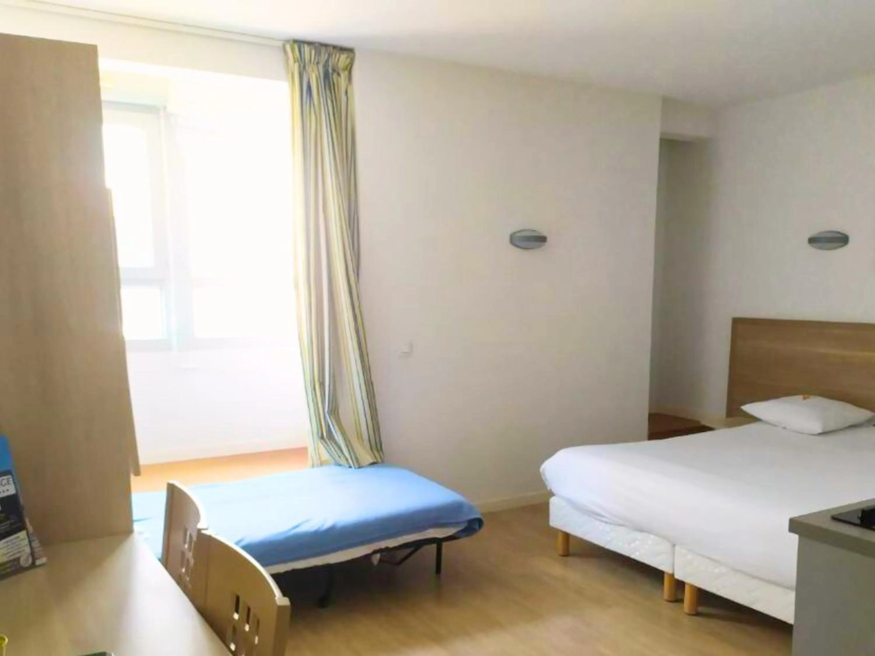 Photo of the whole room, Bed in Lagrange Apart'Hotel l’Escale Marine