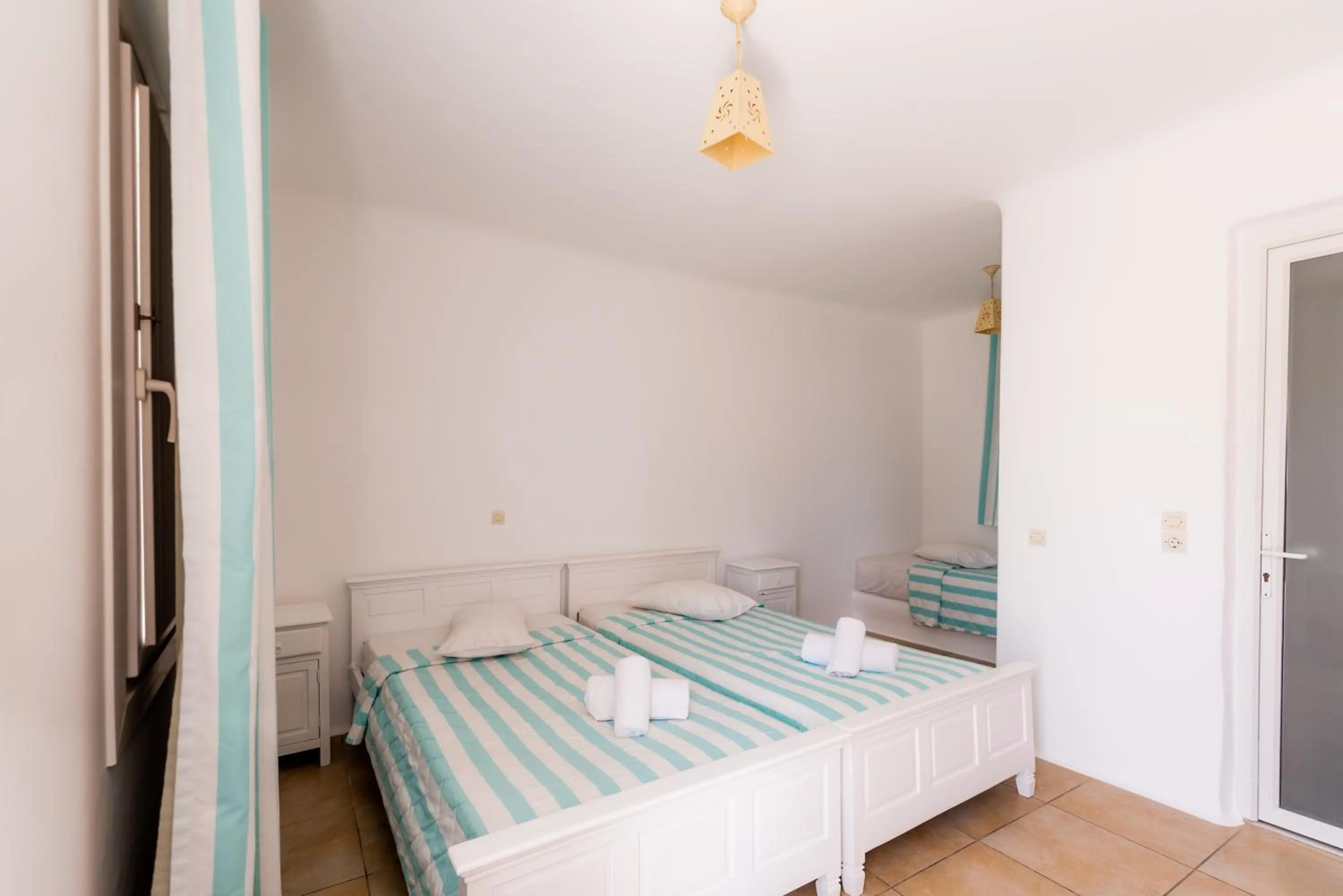 Photo of the whole room, Bed in Paradise Beach Resort