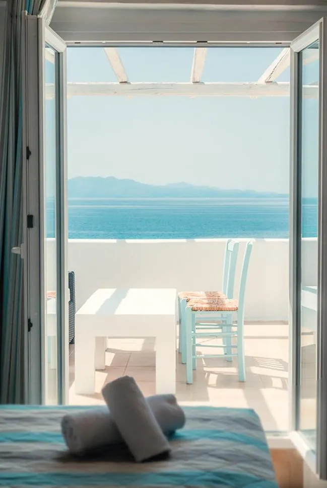 Balcony/Terrace, Bed in Paradise Beach Resort