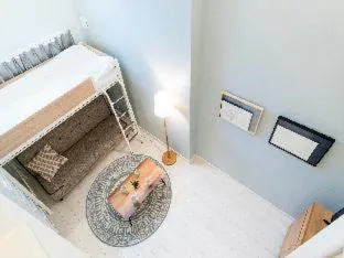 Bed in TRIP POD TAKASAGO A